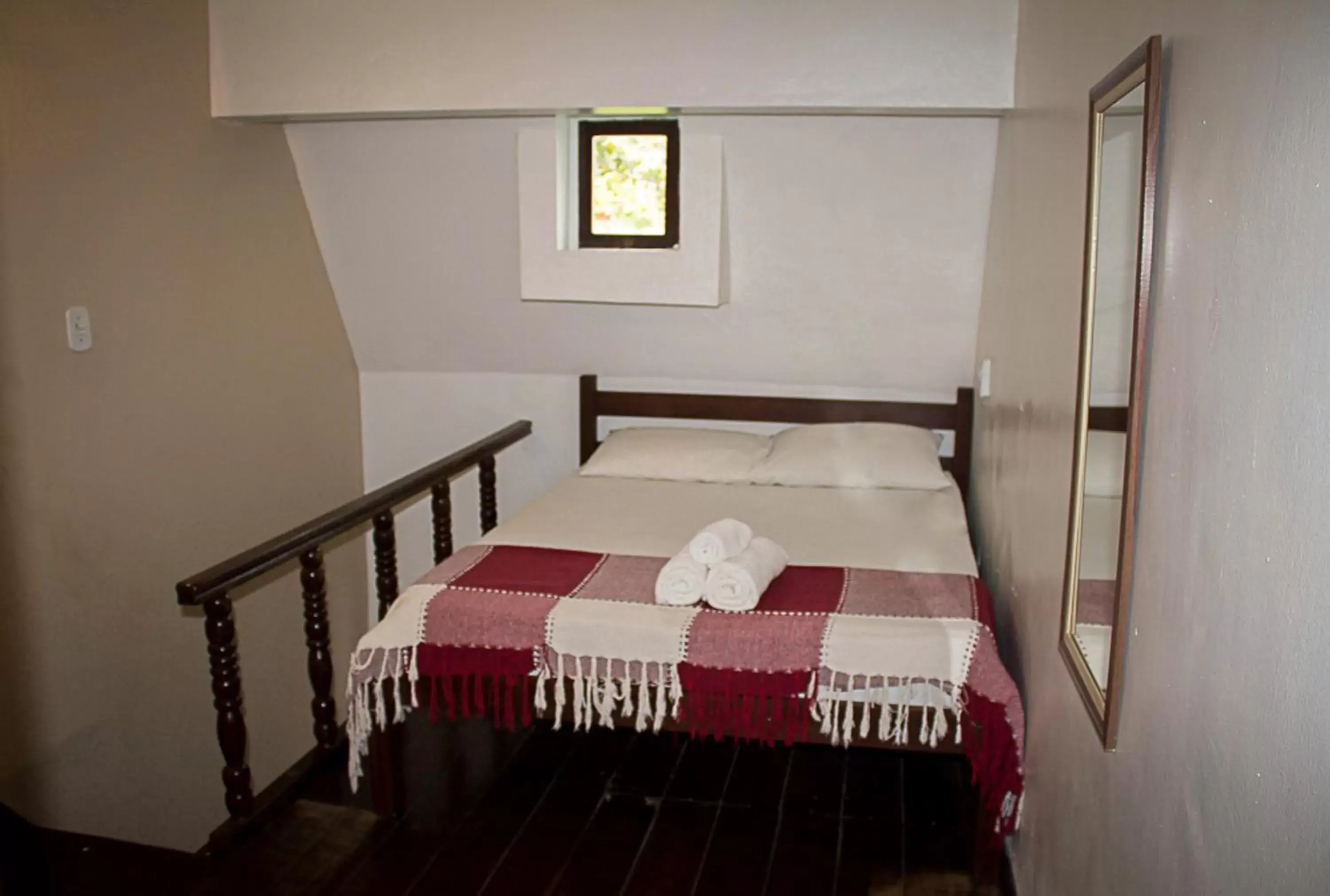 Bed in Pousada Casa da Pedra