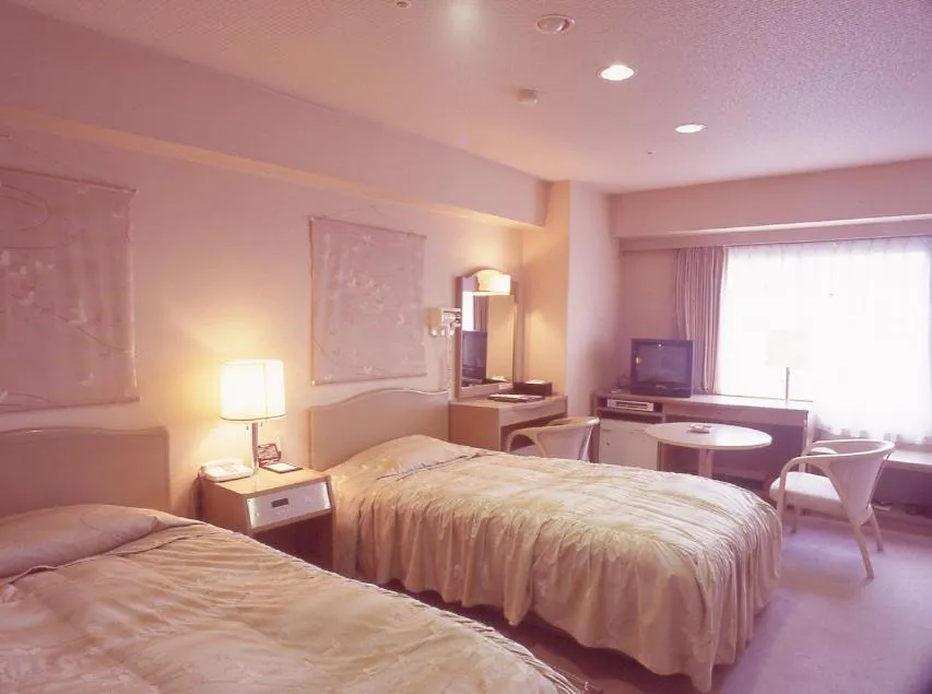 Bed in Tosa Gyoen Hotel