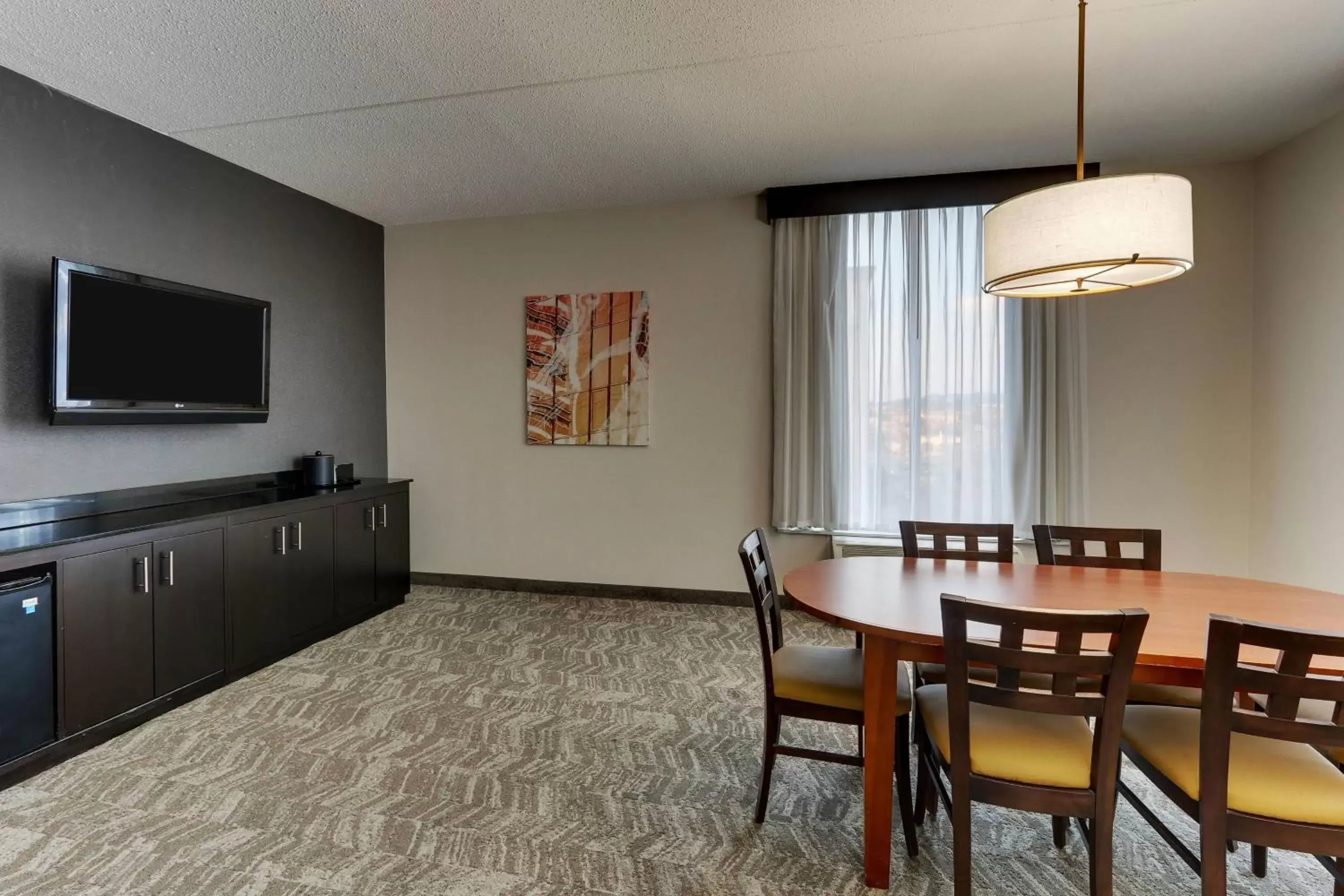 Bedroom, Dining Area in SpringHill Suites by Marriott Birmingham Downtown at UAB