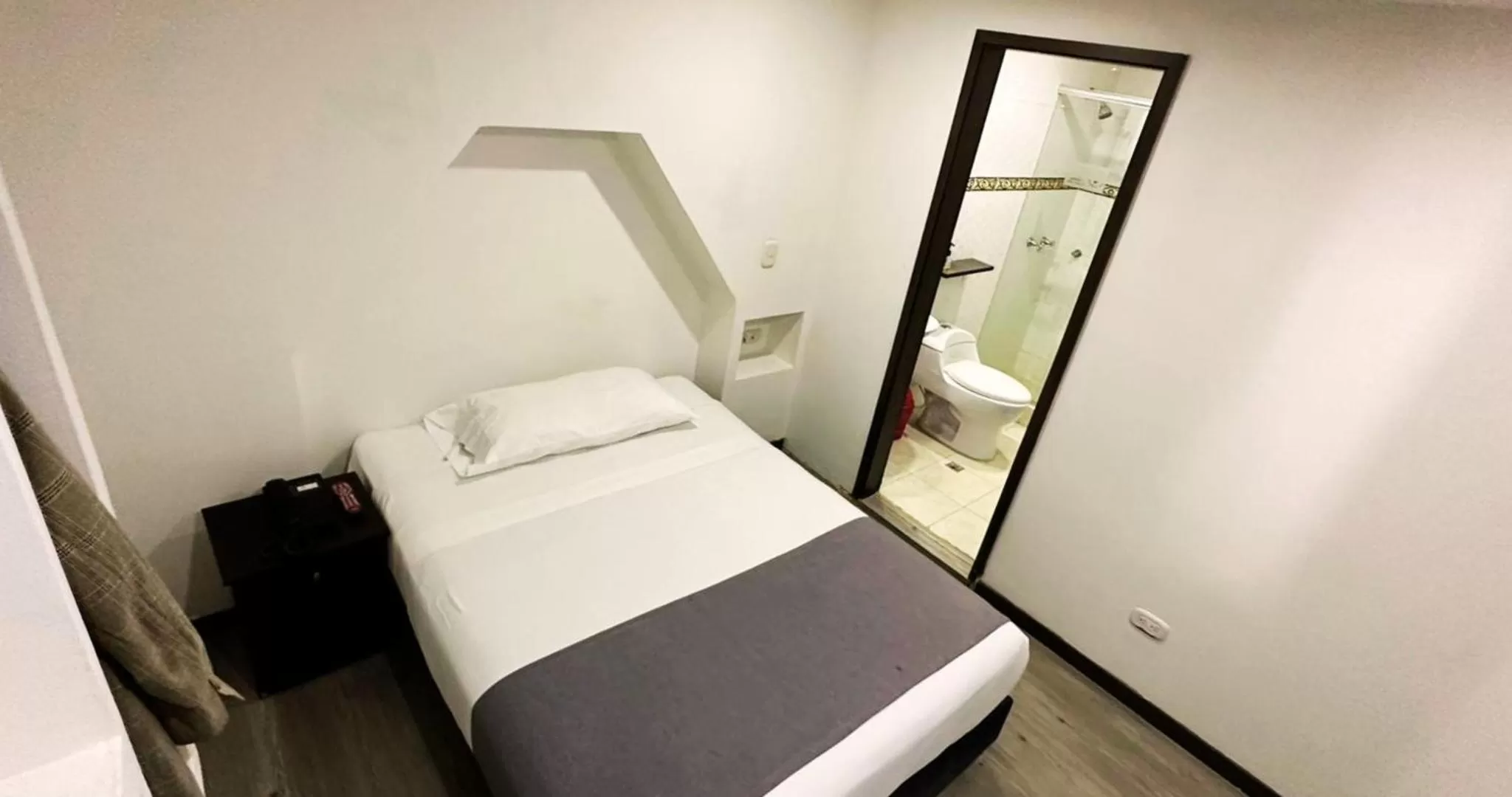 Bed in Hotel Expo Hotel Ferial