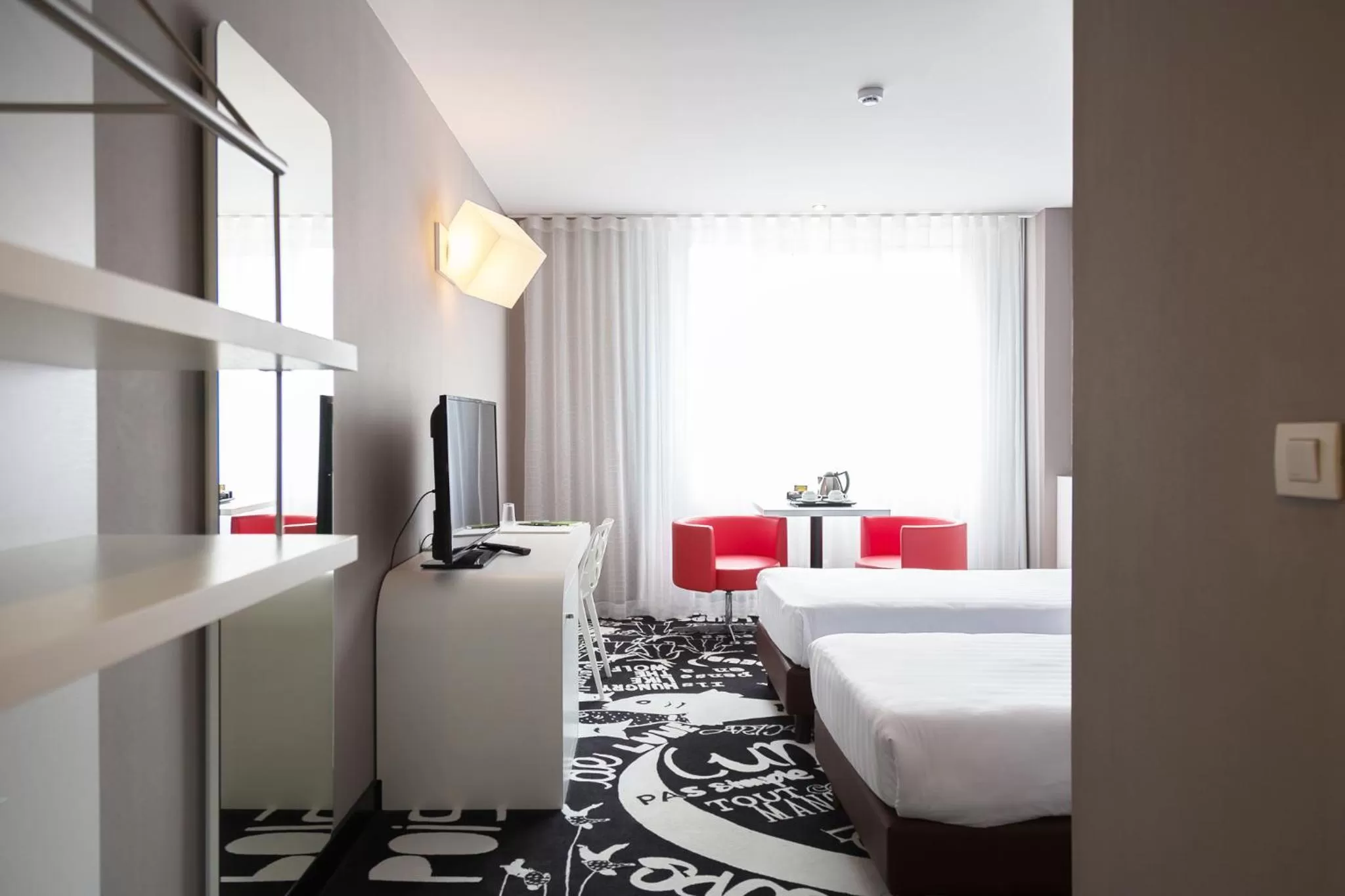 Seating area, Bed in Hotel Tristar