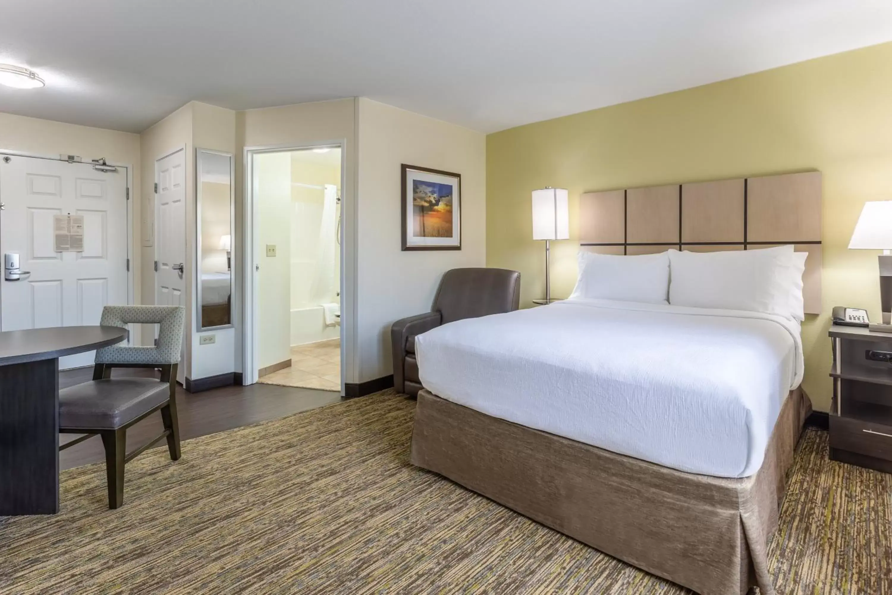 Photo of the whole room, Bed in Candlewood Suites Aurora-Naperville, an IHG Hotel