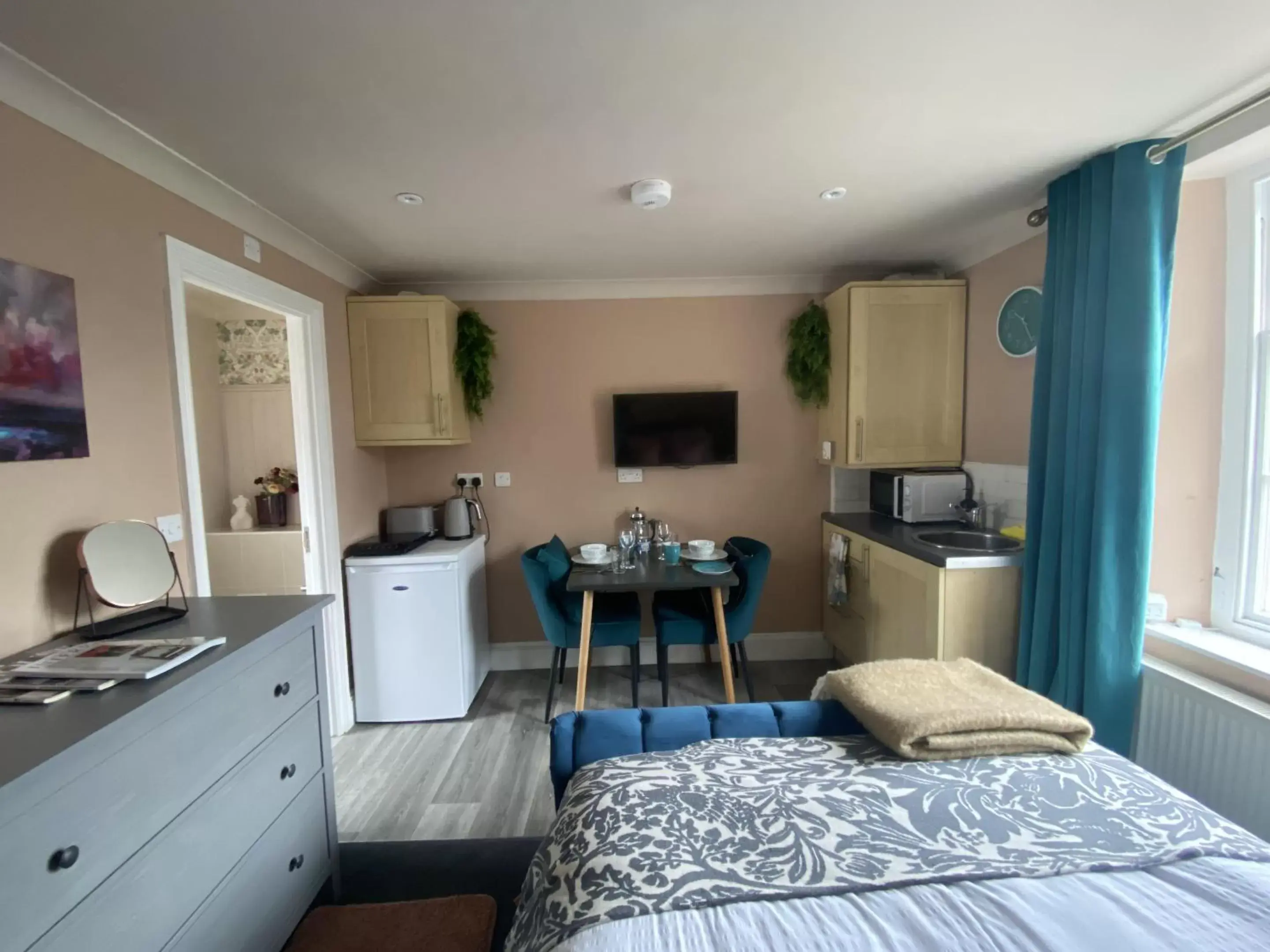 Bedroom, TV/Entertainment Center in One Drake Road and Apartments, Tavistock, Devon