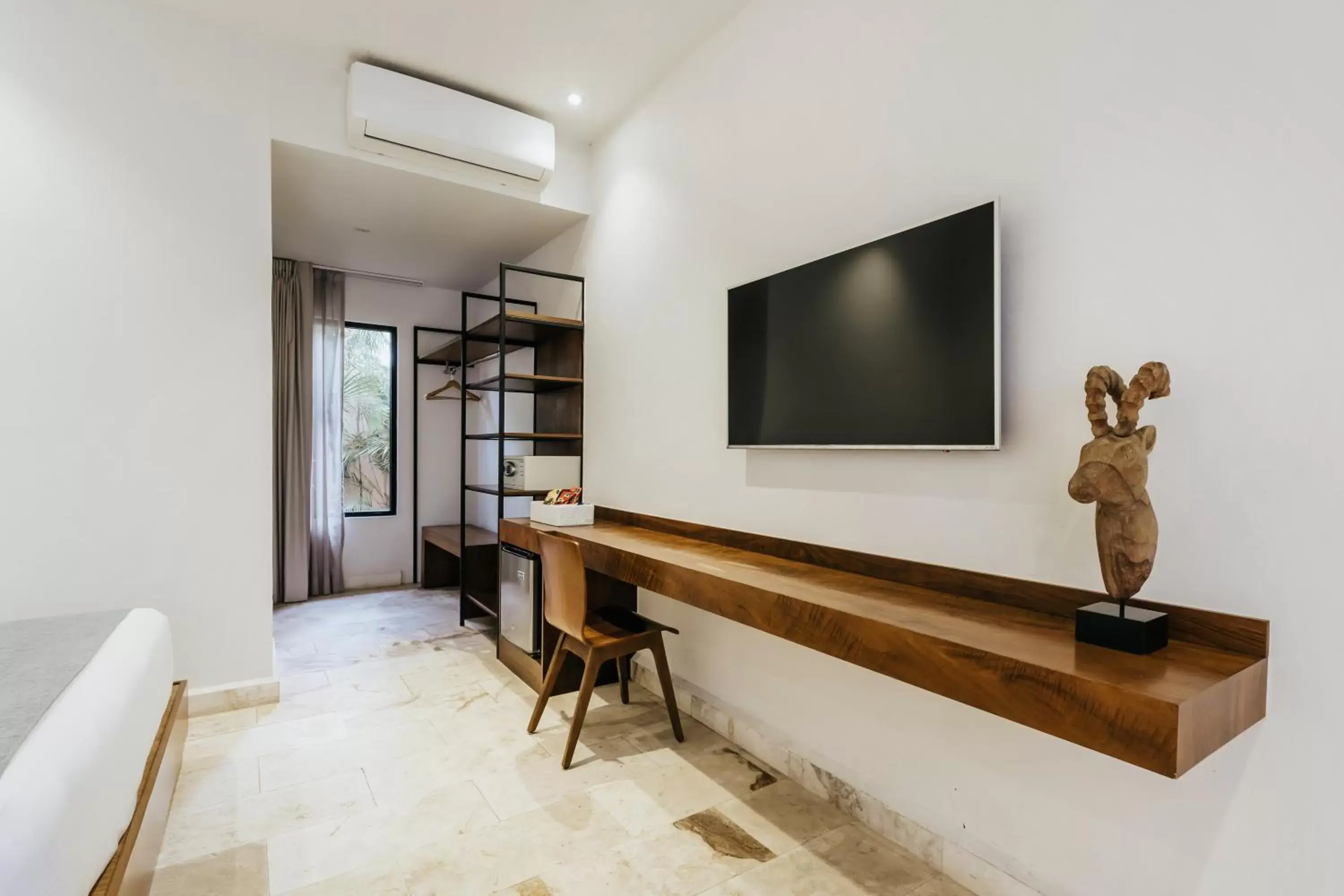 Bedroom, TV/Entertainment Center in The Strabon Tulum