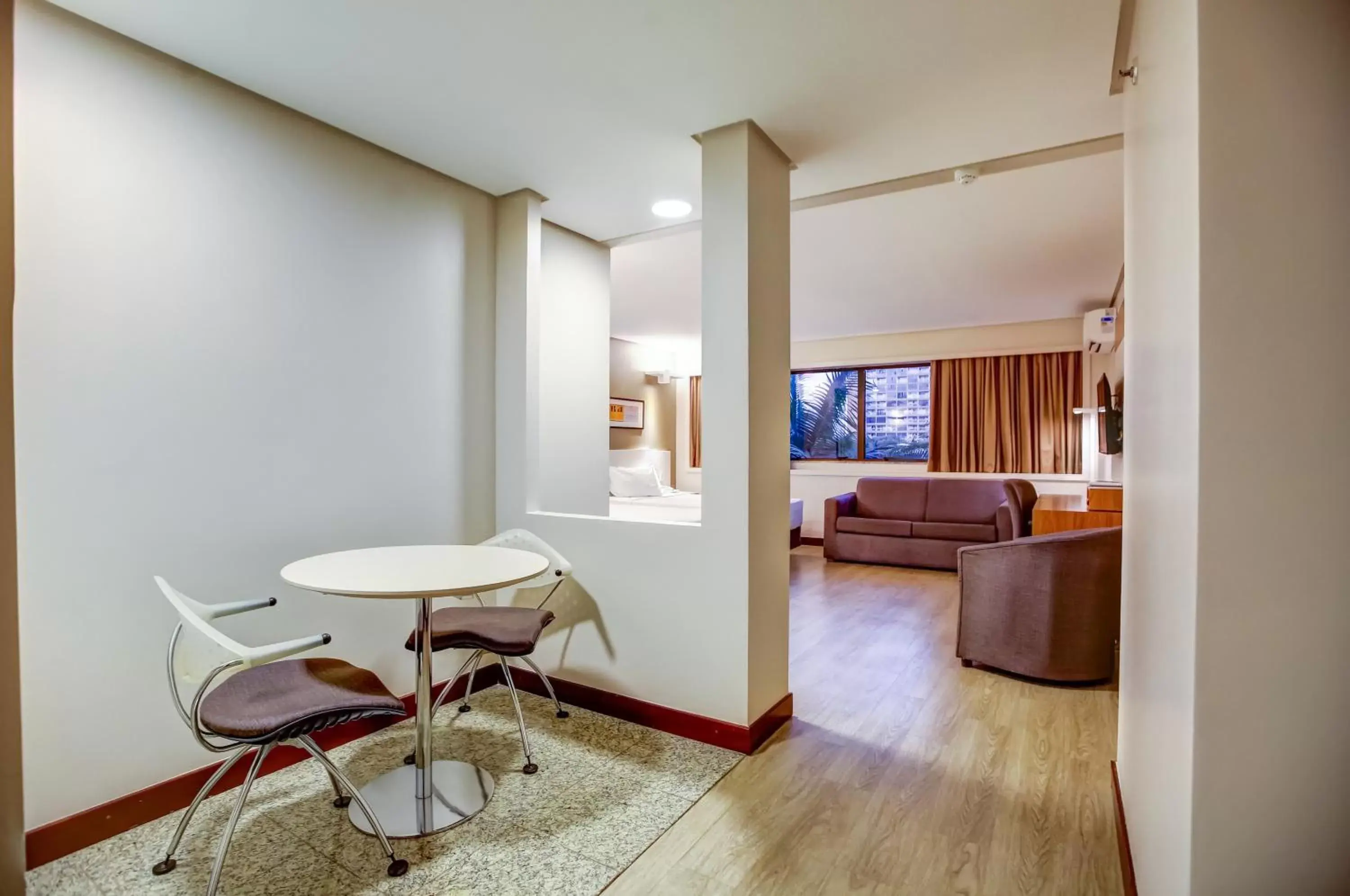 Bedroom, Seating Area in Comfort Suites Brasília