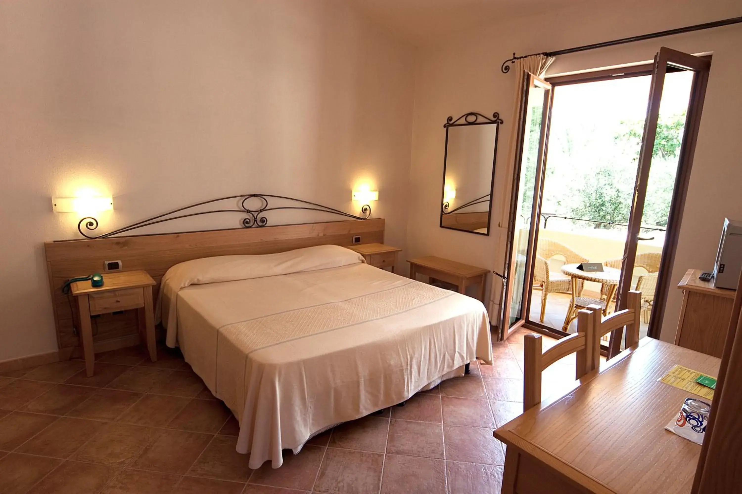 Photo of the whole room, Bed in Hotel Villa Gustui Maris