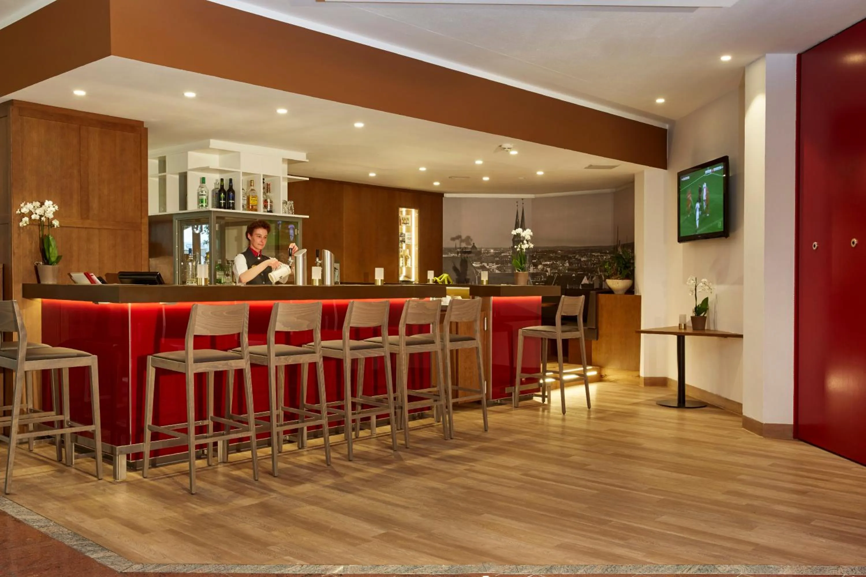 Lounge or bar in H+ Hotel Nürnberg