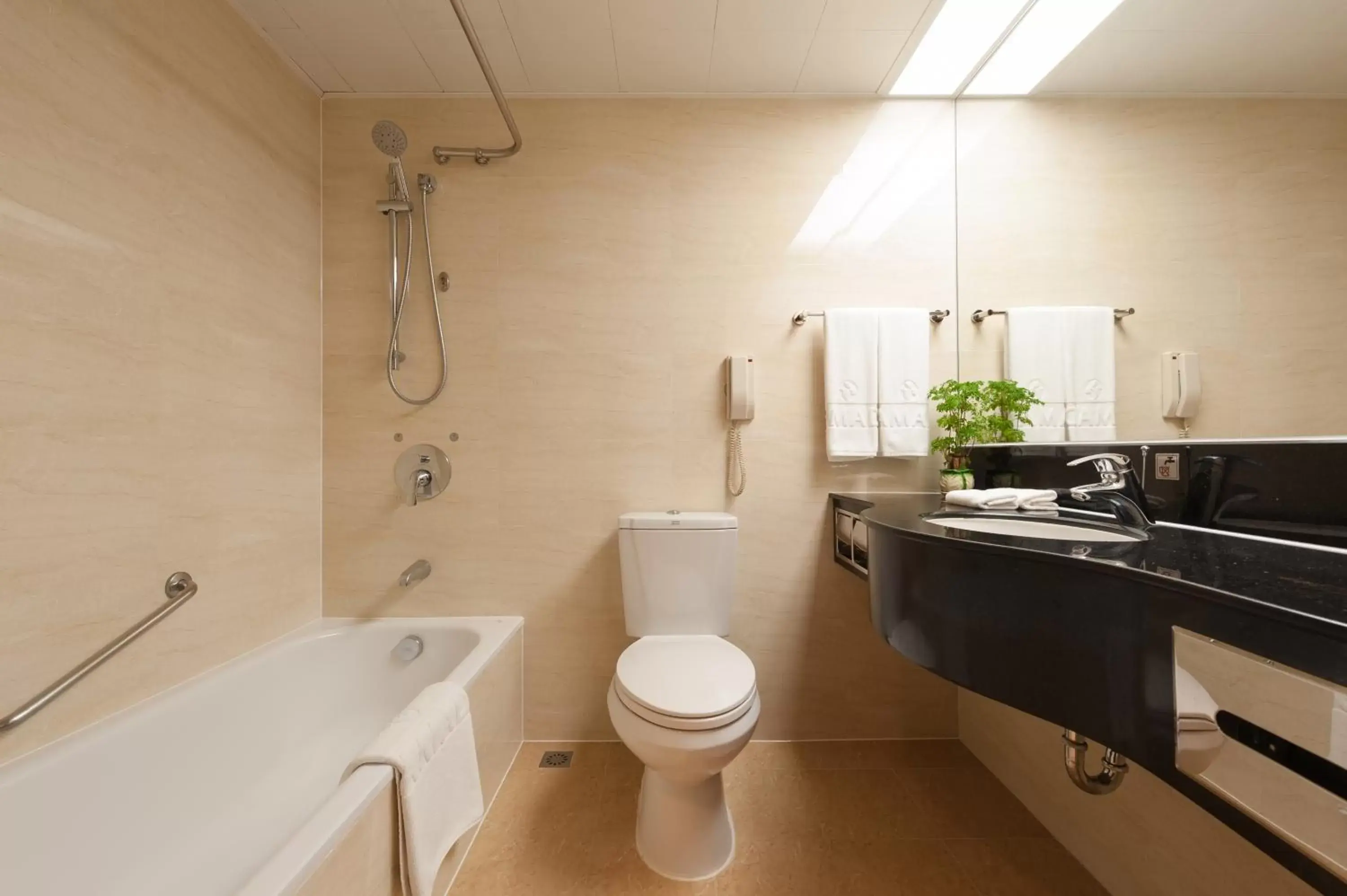 Bathroom in Ramada by Wyndham Pearl Guangzhou-Canton Fair Free Shuttle Bus