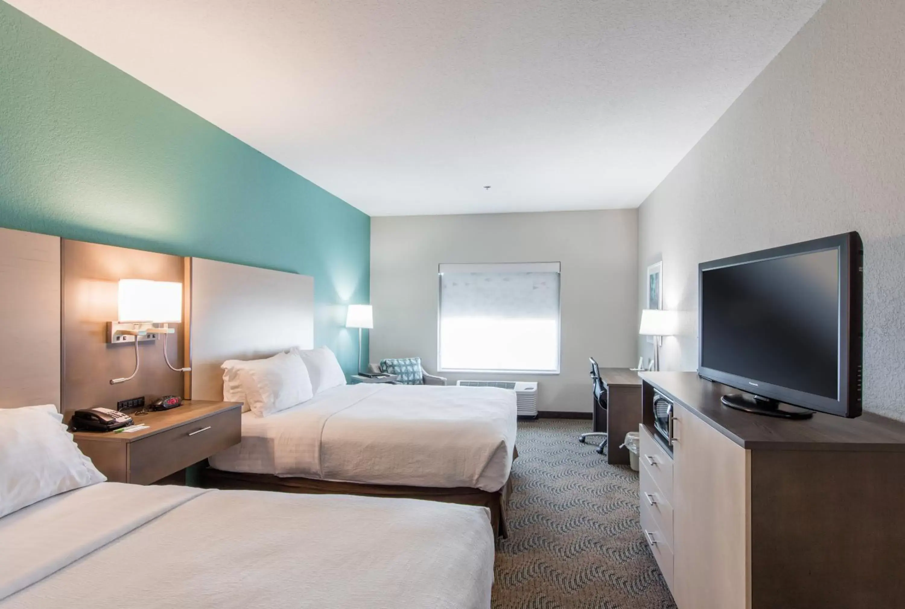 Photo of the whole room, TV/Entertainment Center in Holiday Inn Hotel & Suites Lake City, an IHG Hotel