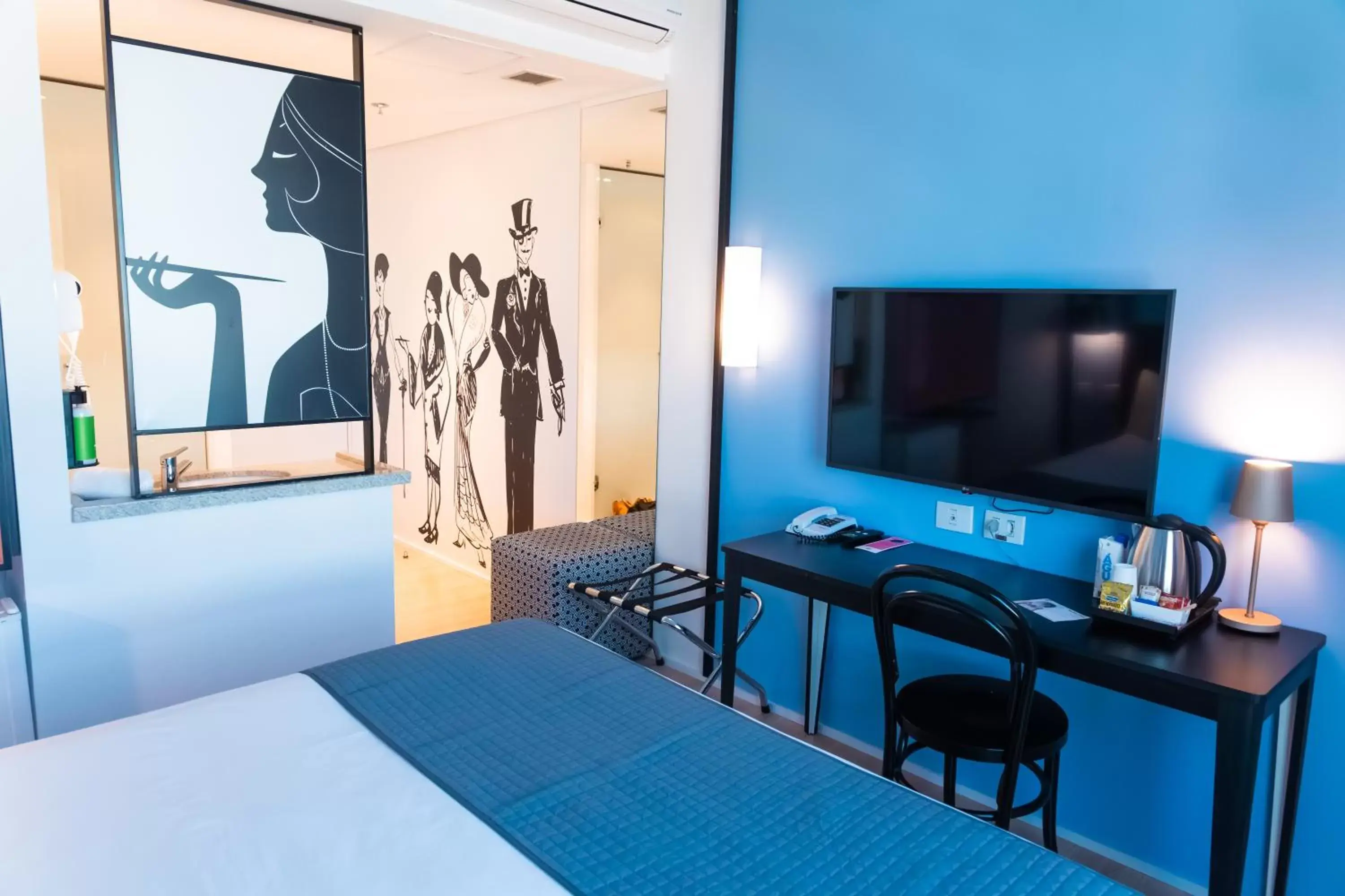 Bedroom, TV/Entertainment Center in ibis Styles Goiania Marista