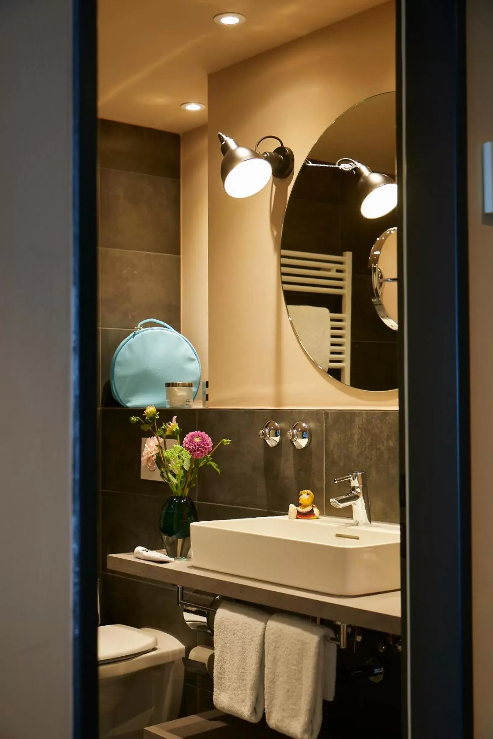 Bathroom in Hotel Metropol by Maier Privathotels