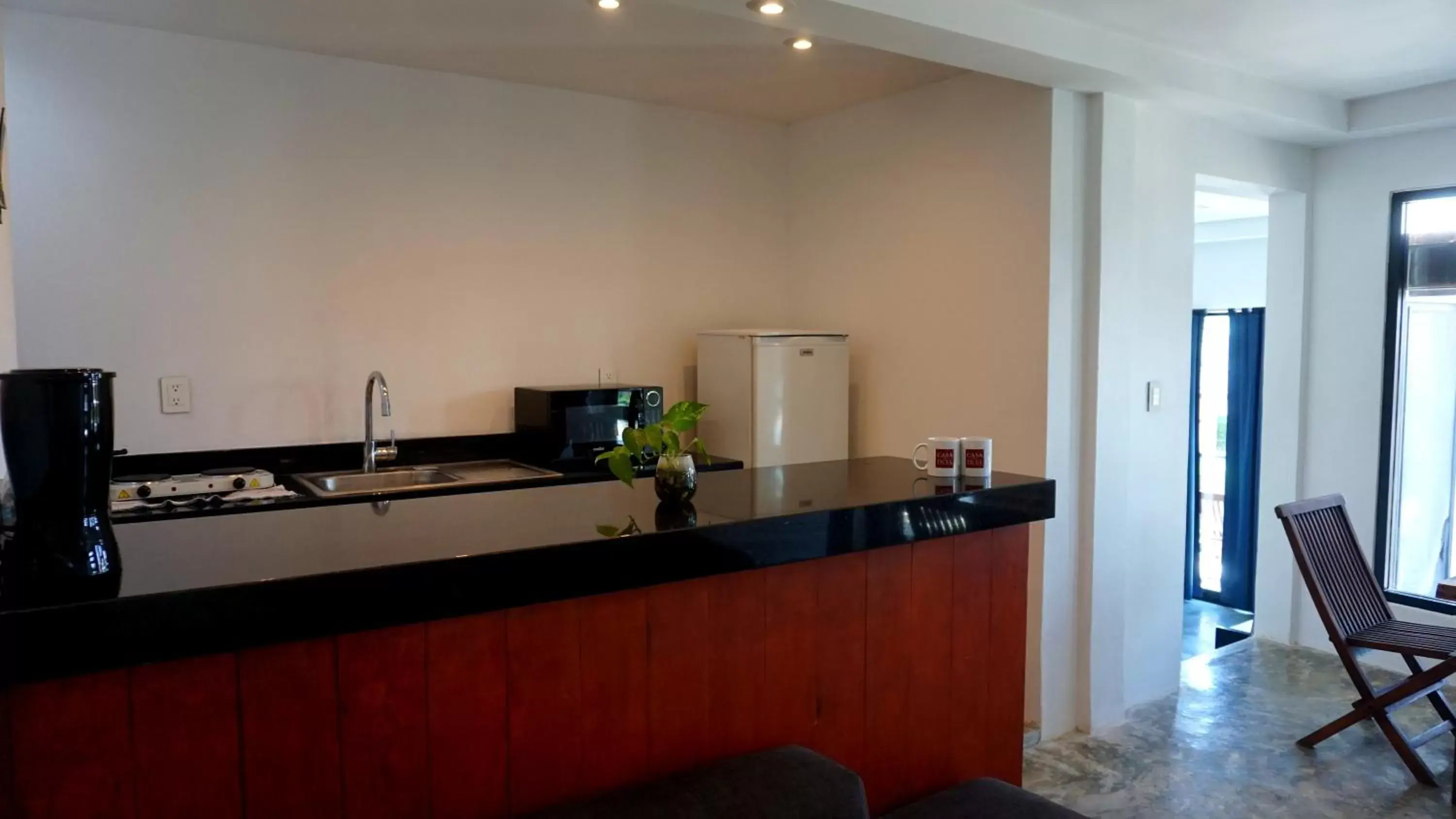 Dining area, Kitchen/Kitchenette in Casa Ticul Hotel Boutique - 5Th Ave by BFH