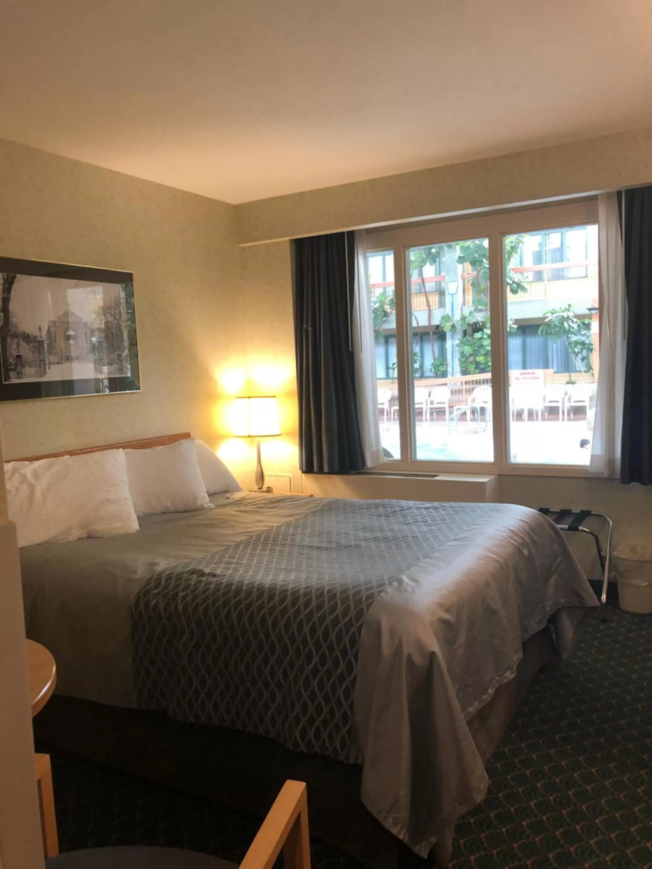 Pool view, Bed in Travelodge by Wyndham Winnipeg East