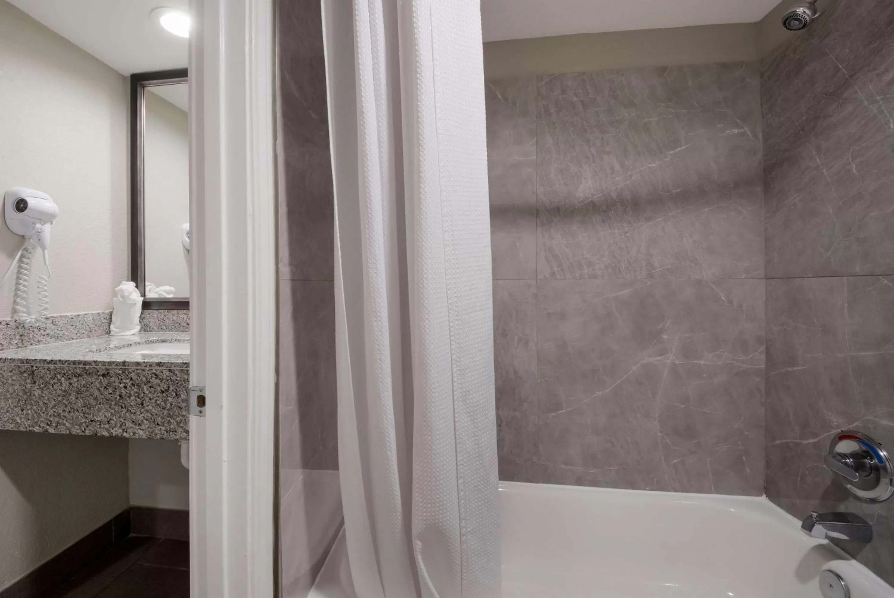 Bathroom in SureStay Plus Hotel by Best Western San Antonio North