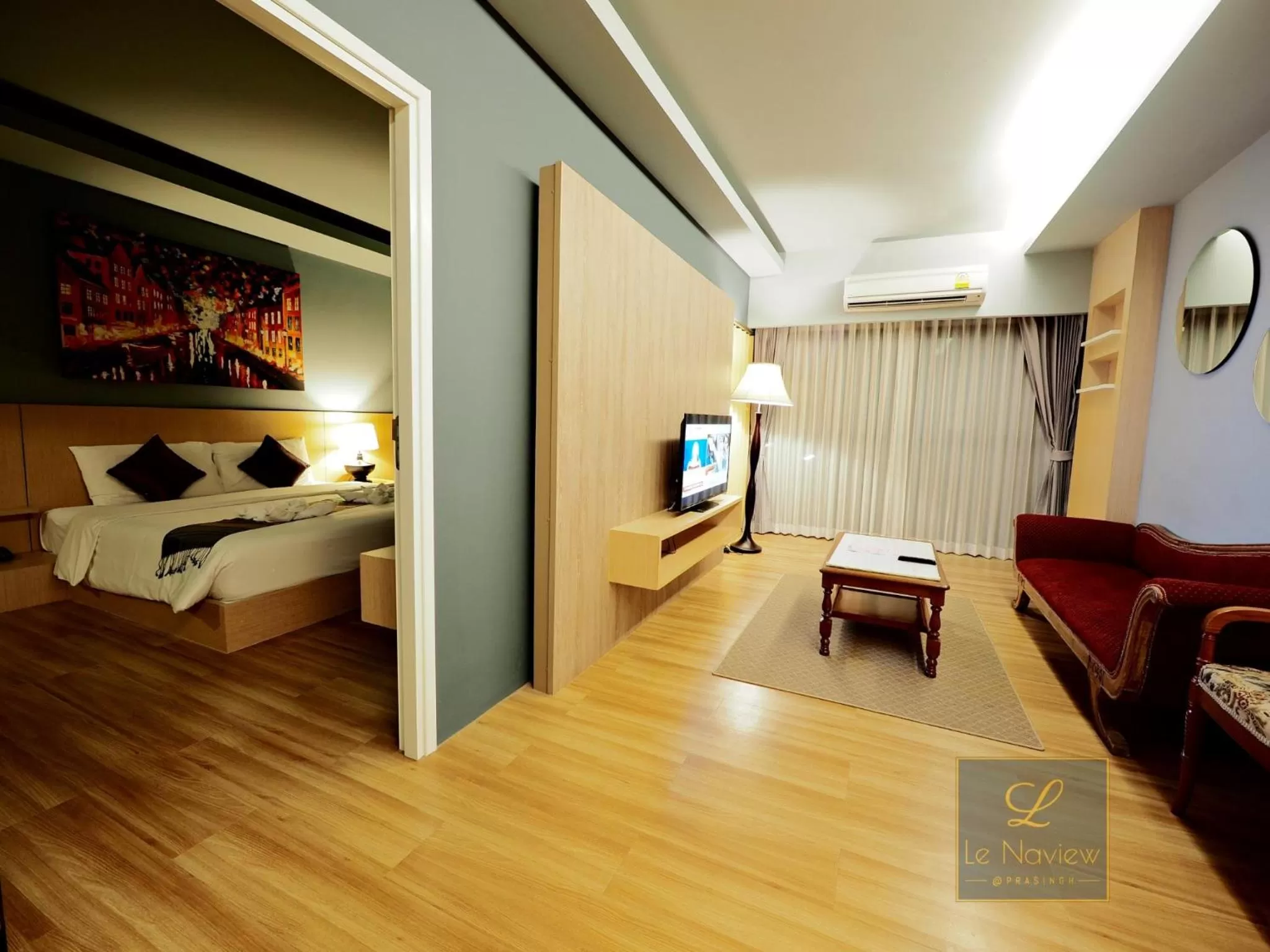 Living room, Bed in Le Naview @Prasingh