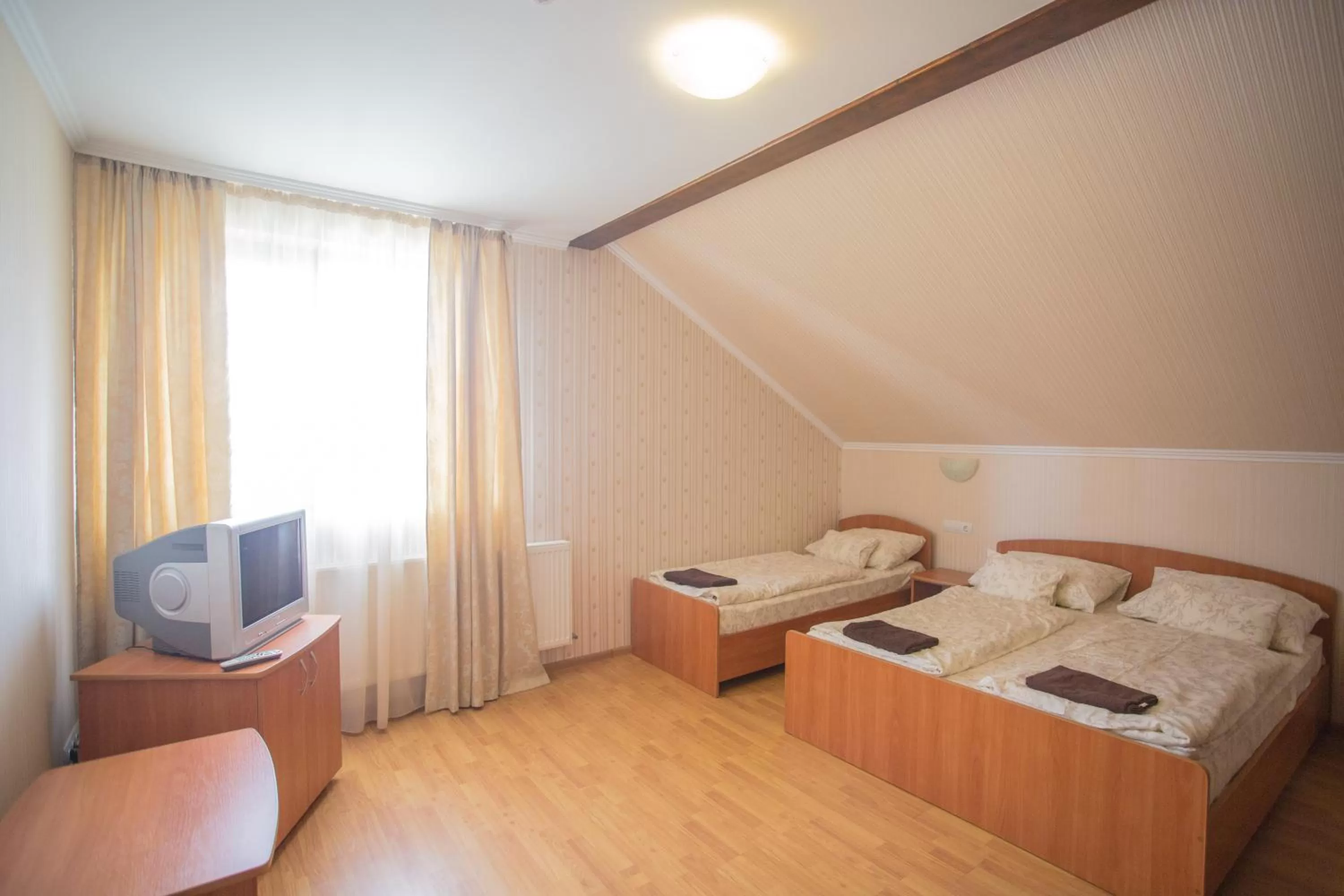 Photo of the whole room, Bed in Praktik Hotel & Restaurant