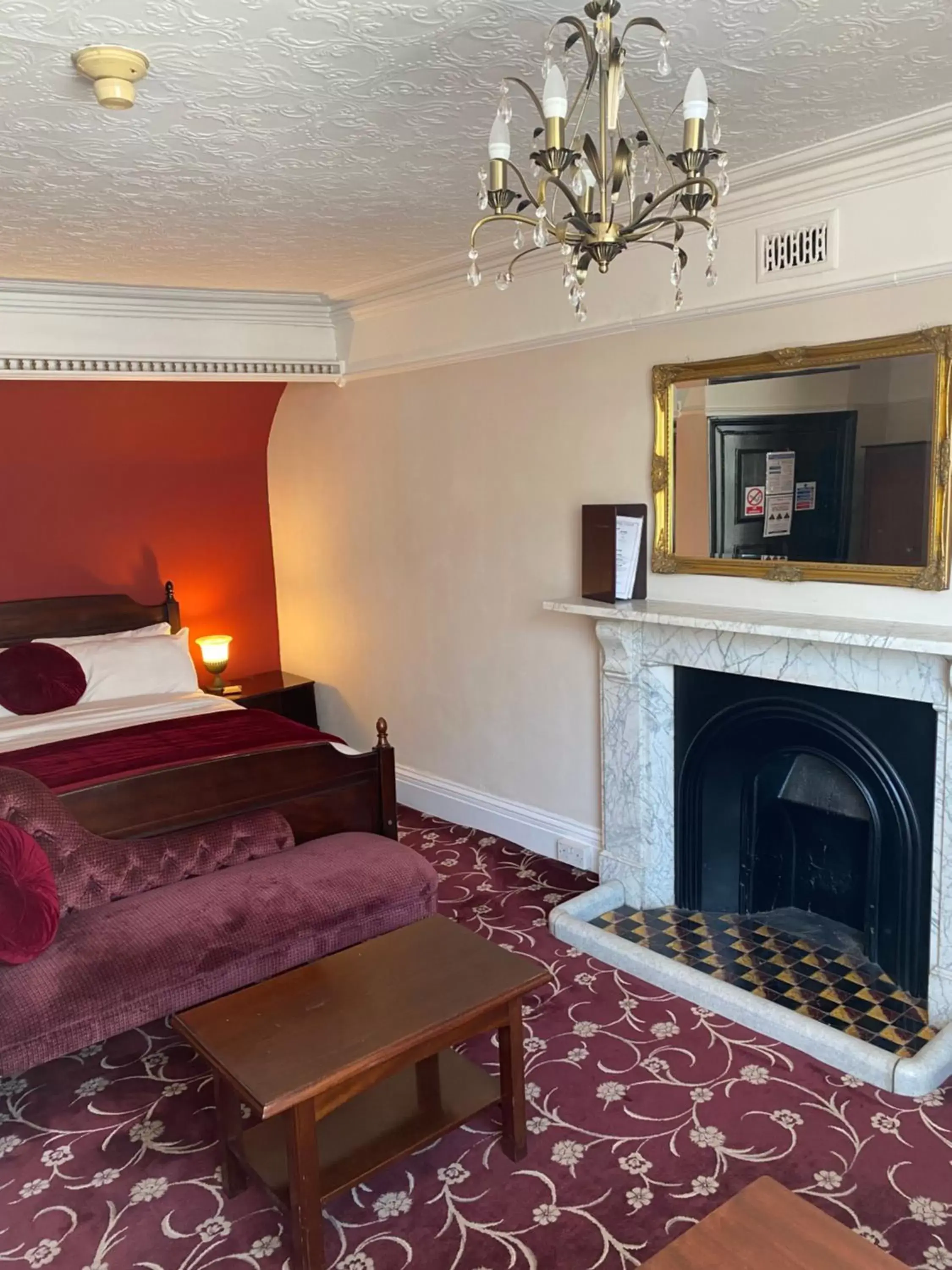 Bedroom in The Tudor Hotel