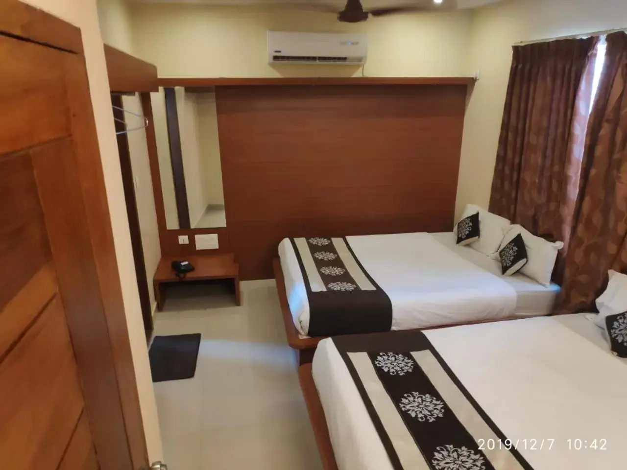 Quadruple Room in The Grand Inn Mysore Quadruple Room in The Grand Inn Mysore