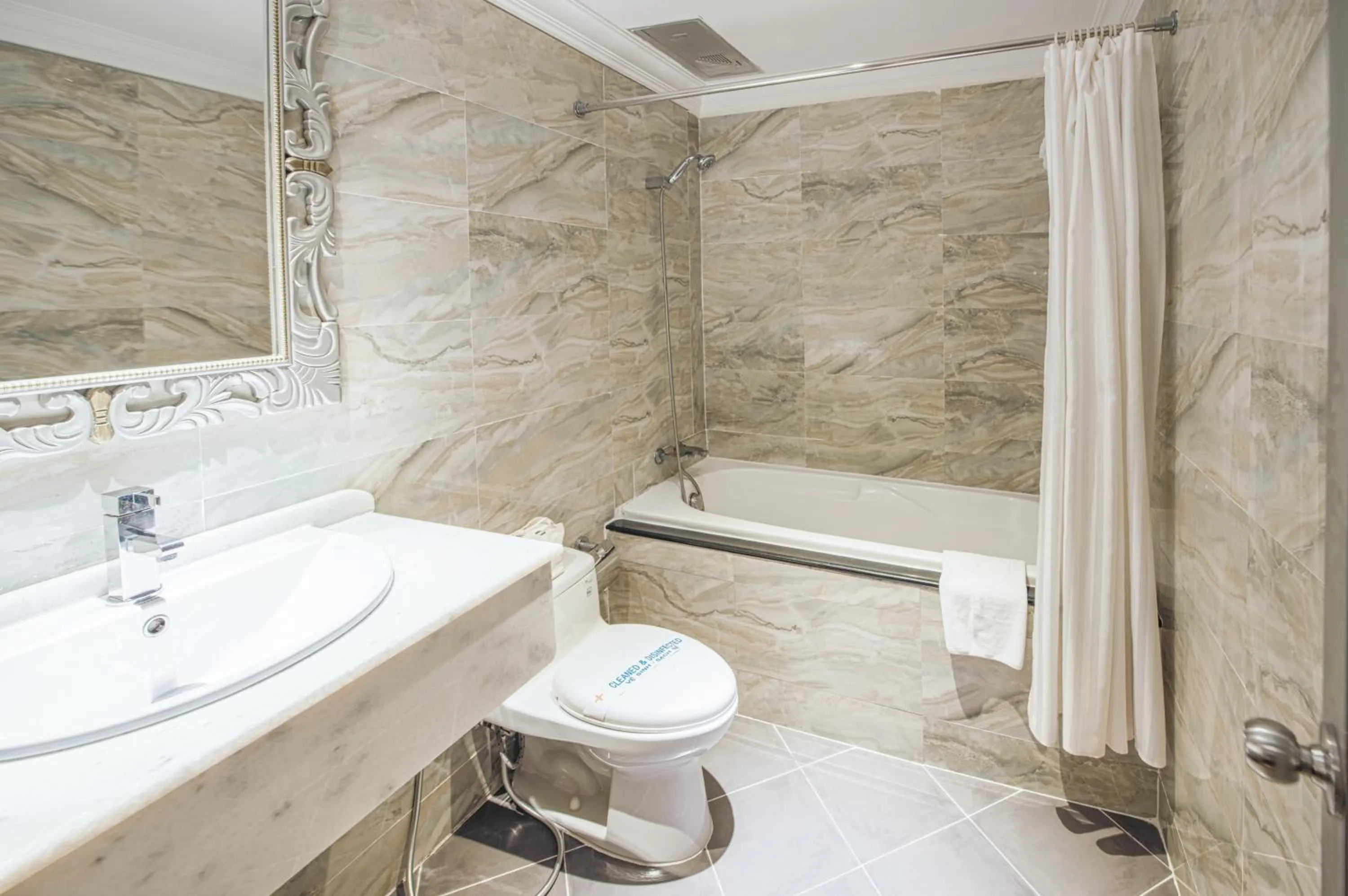 Toilet in A&EM - The Petit Hotel