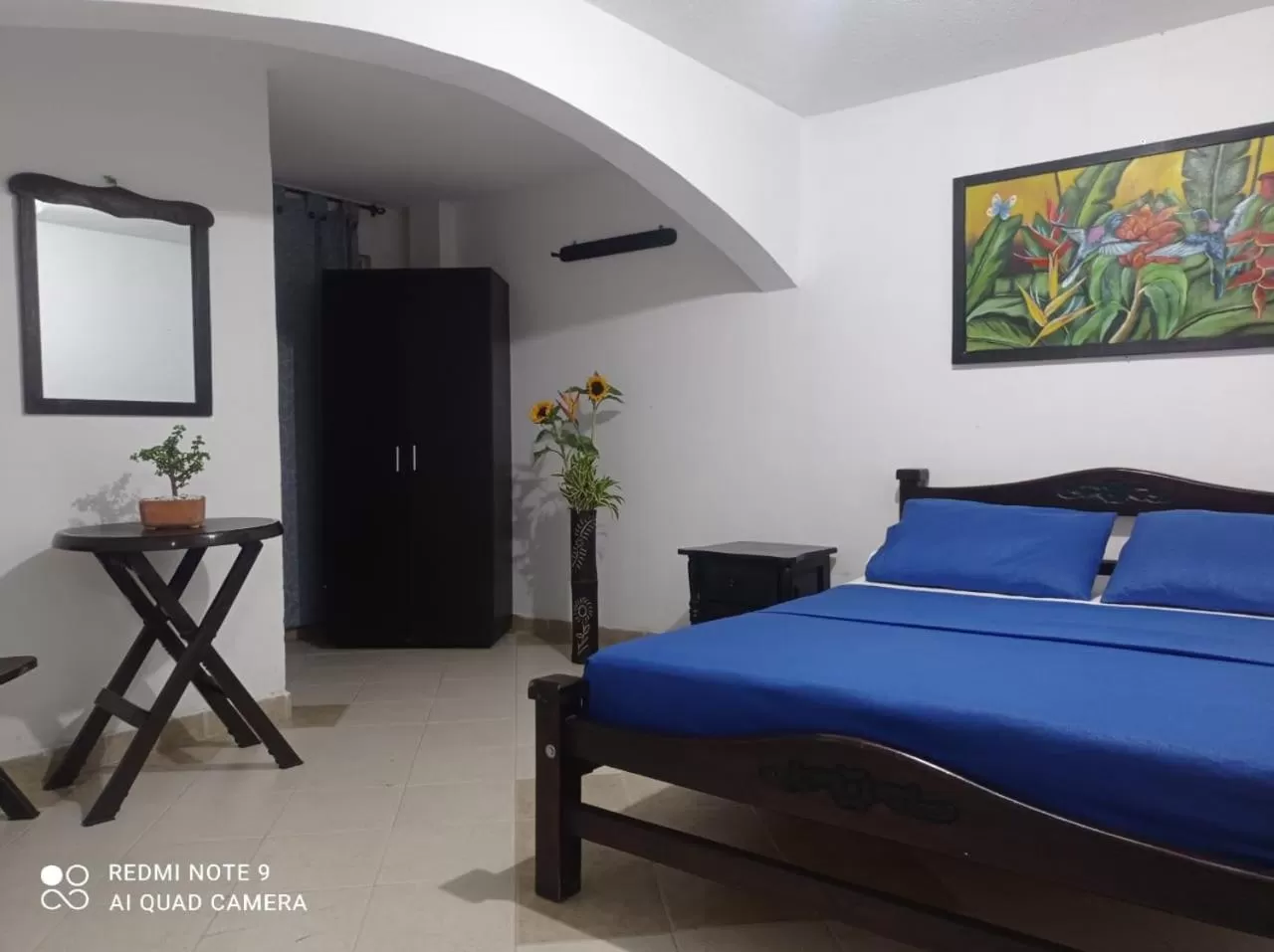 Communal lounge/ TV room in Hotel Plaza Calarcá