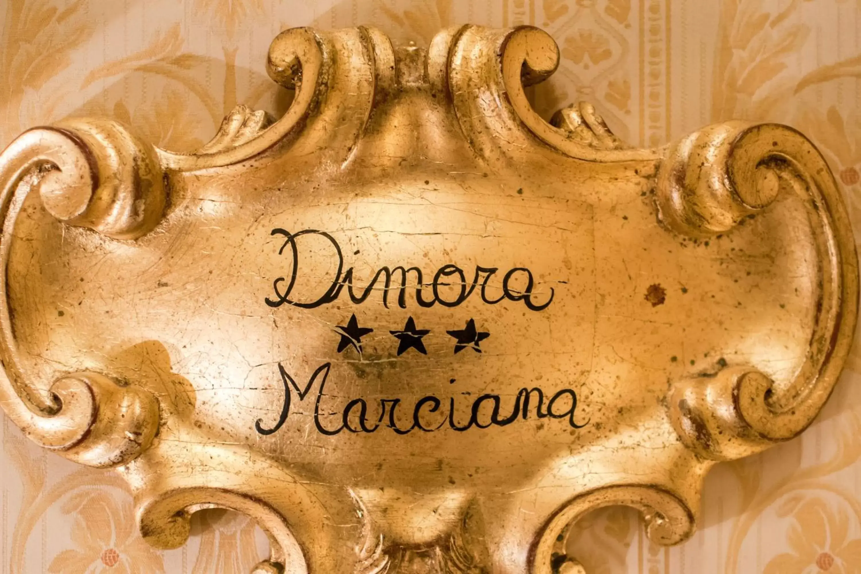 Property logo or sign in Dimora Marciana