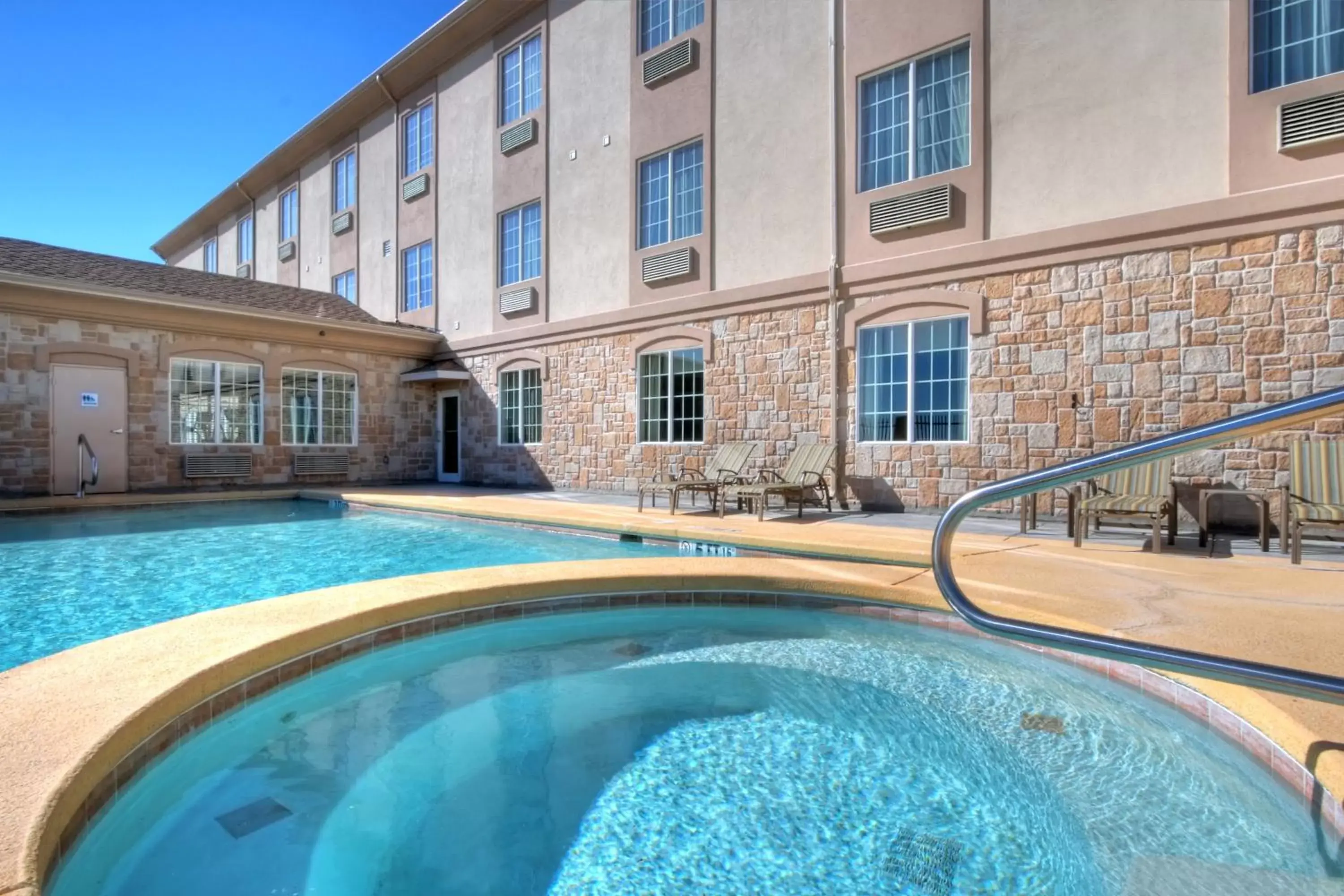 Swimming pool, Property Building in Holiday Inn Express & Suites Pecos, an IHG Hotel