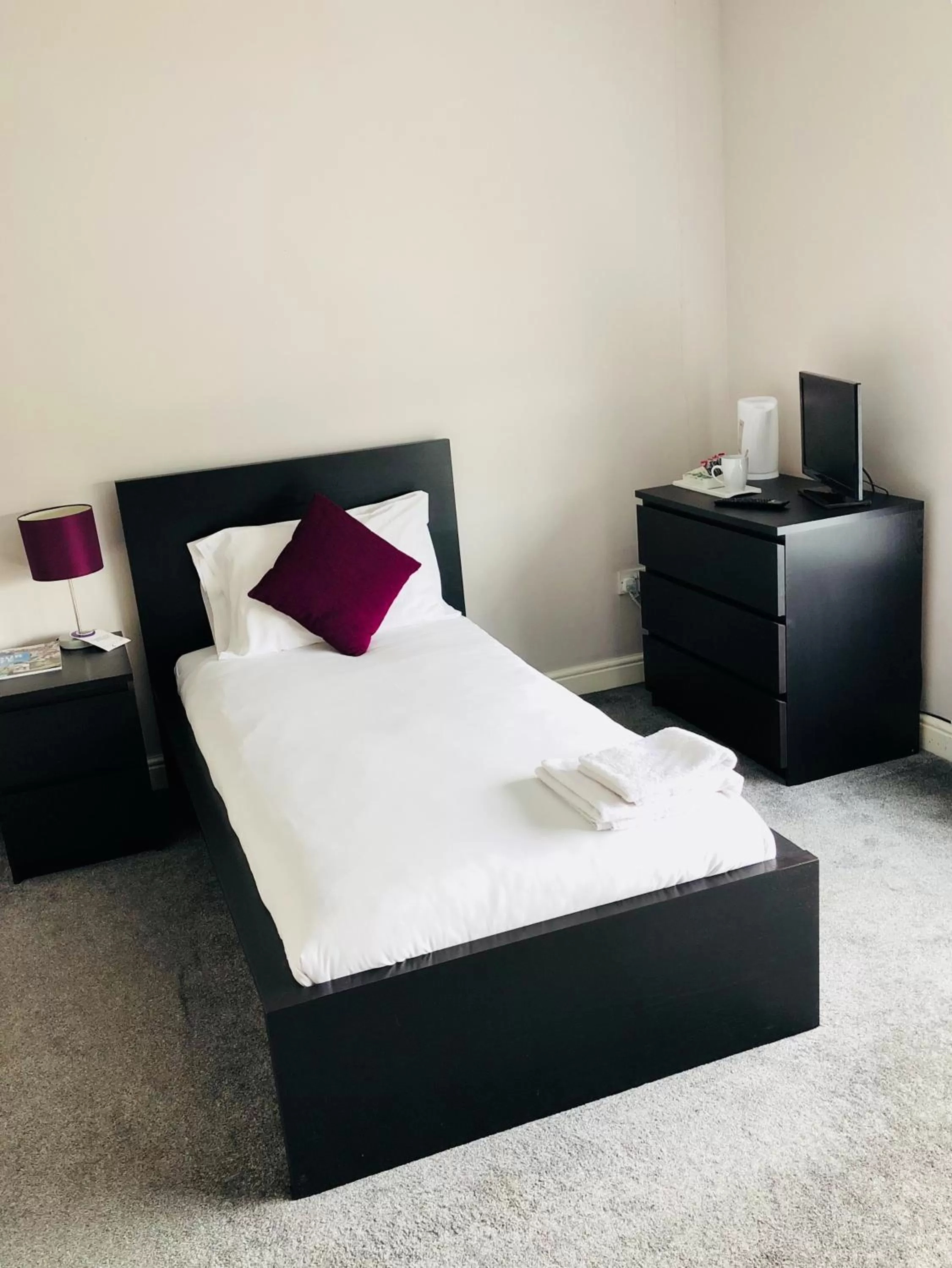 Bed in The Embassy Hotel