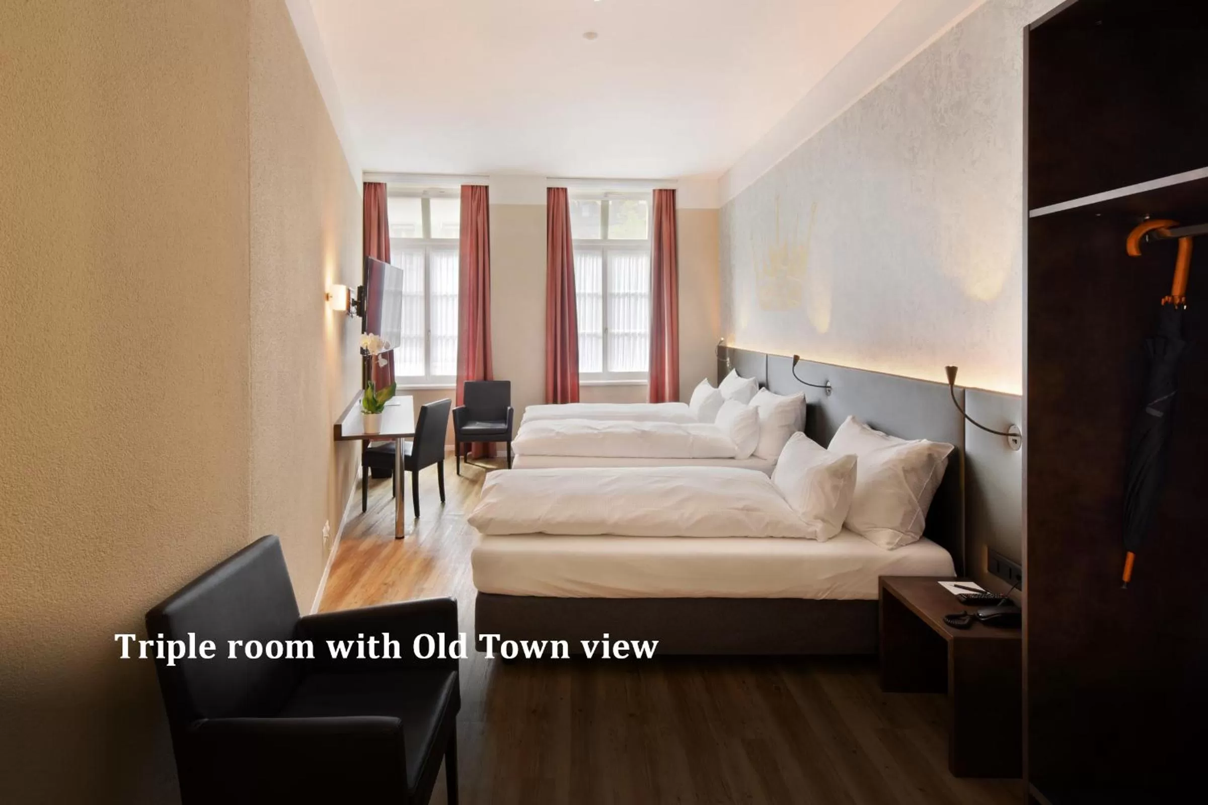 Photo of the whole room, Bed in Altstadt Hotel Krone Luzern
