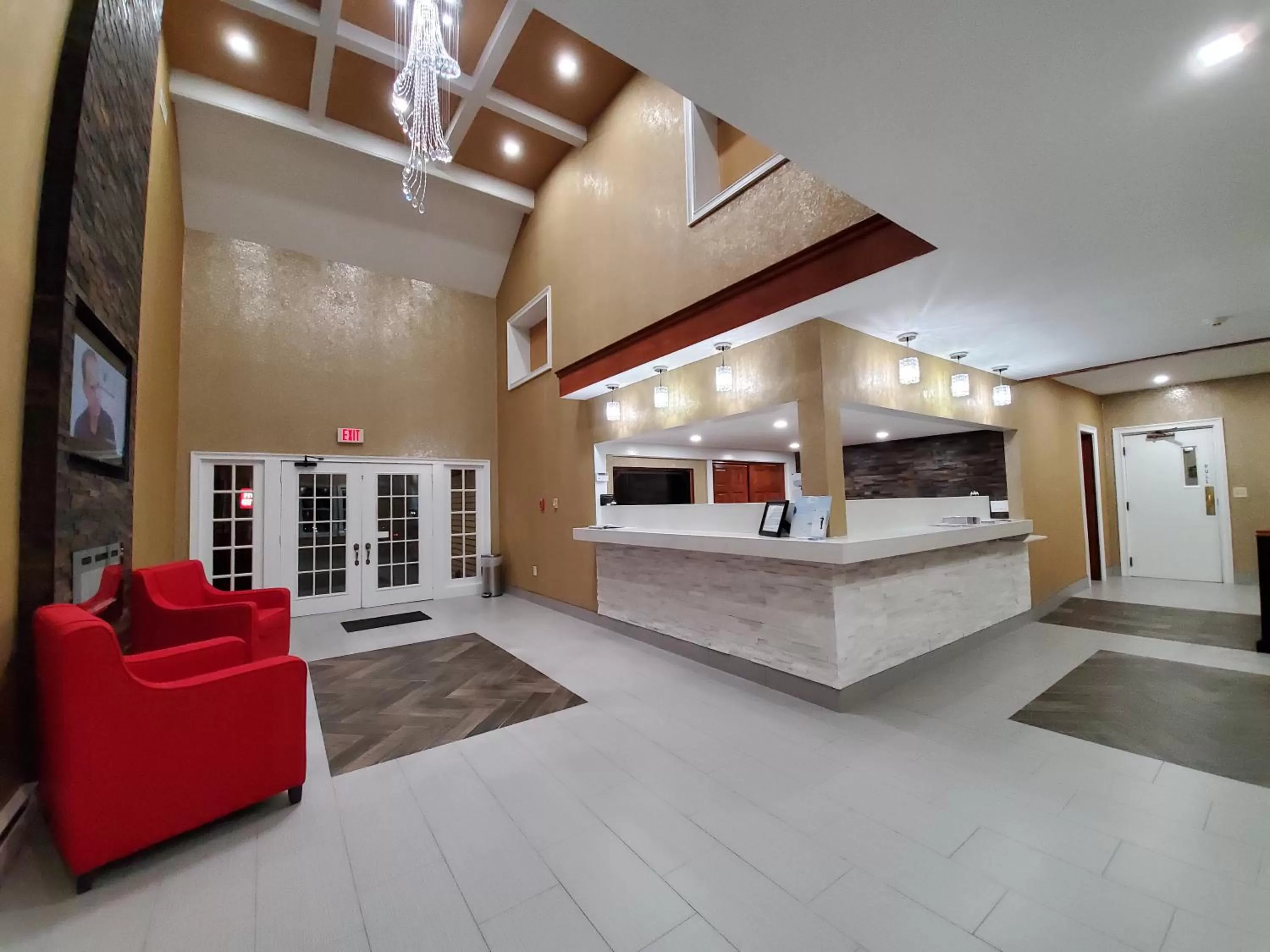 Seating area in Ramada by Wyndham Groton Mystic