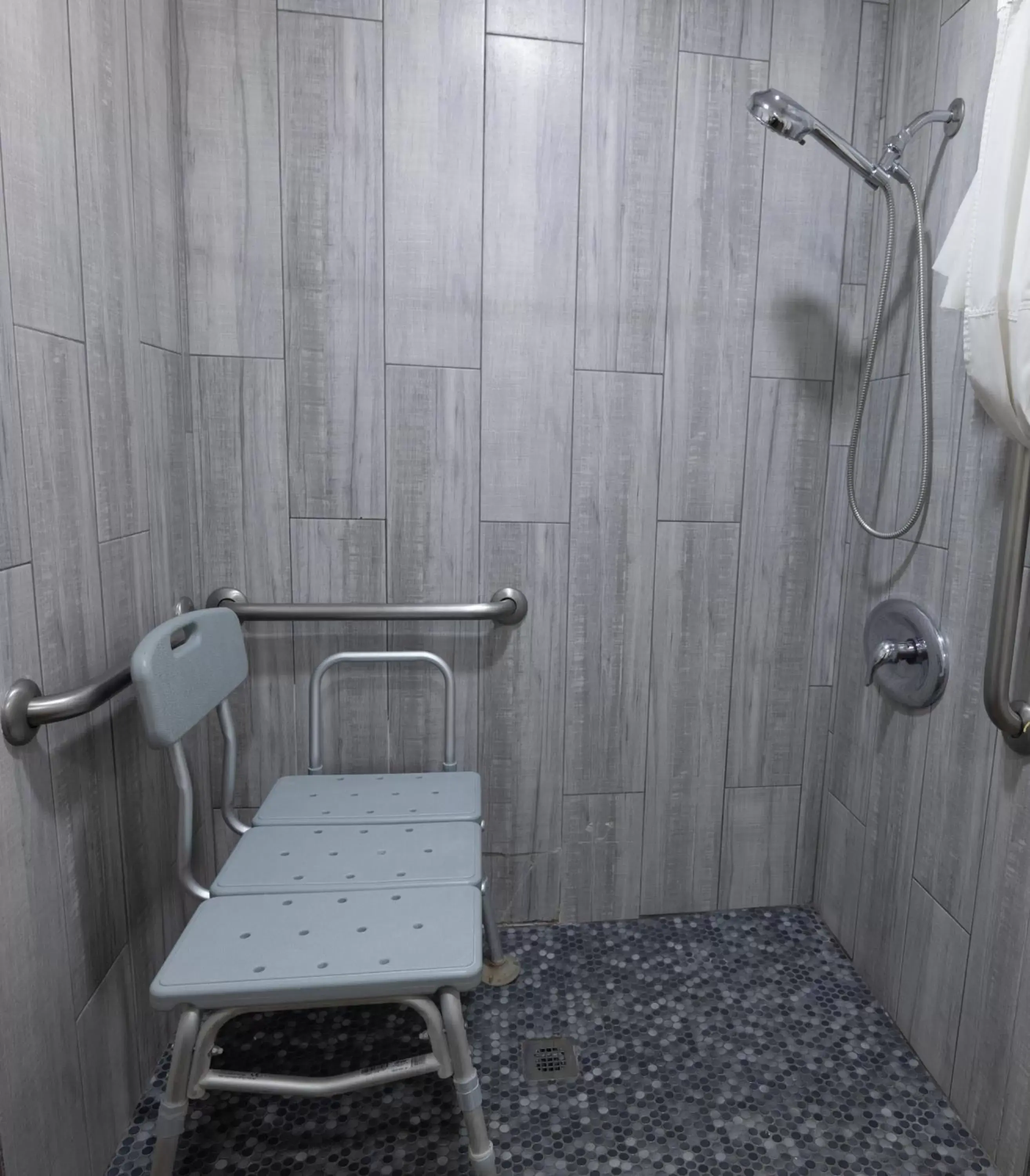 Shower, Bathroom in Hospitality Inn