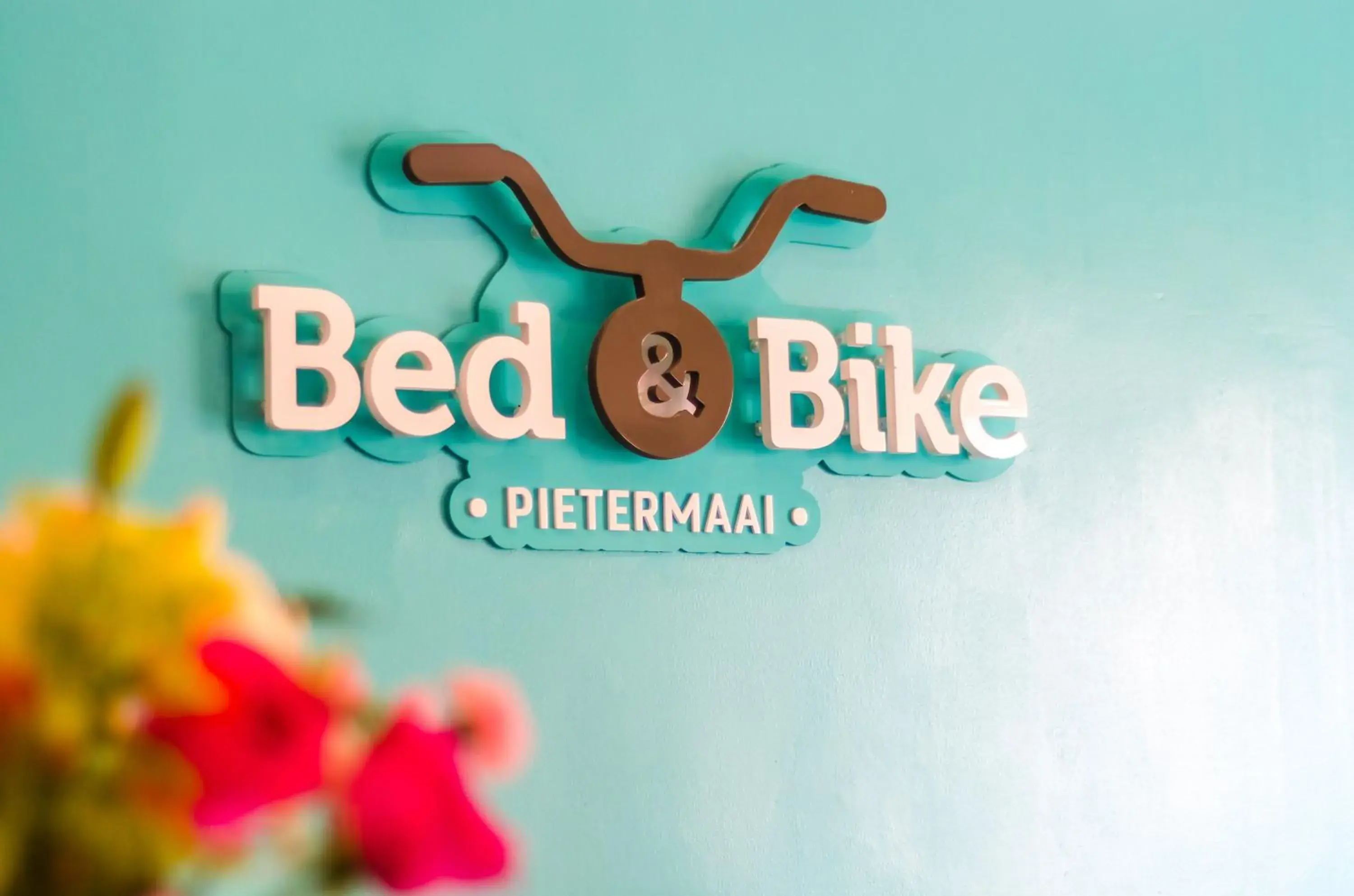 Property logo or sign in Bed & Bike Curacao