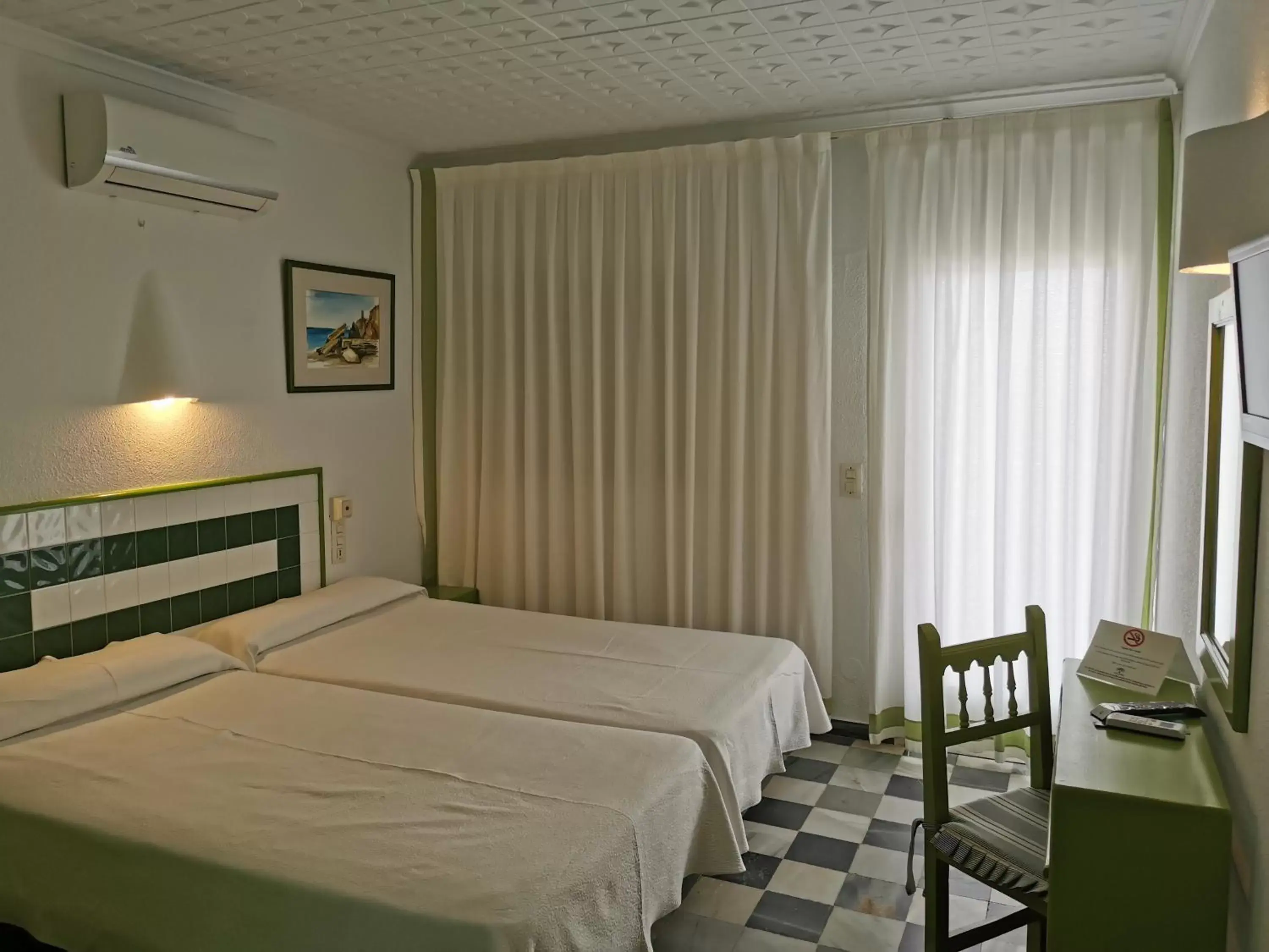 Bed in Hotel El Puntazo I