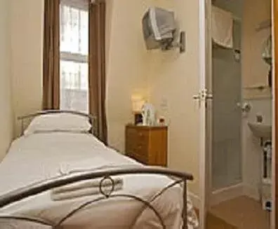 Bedroom in All Seasons Lodge Hotel