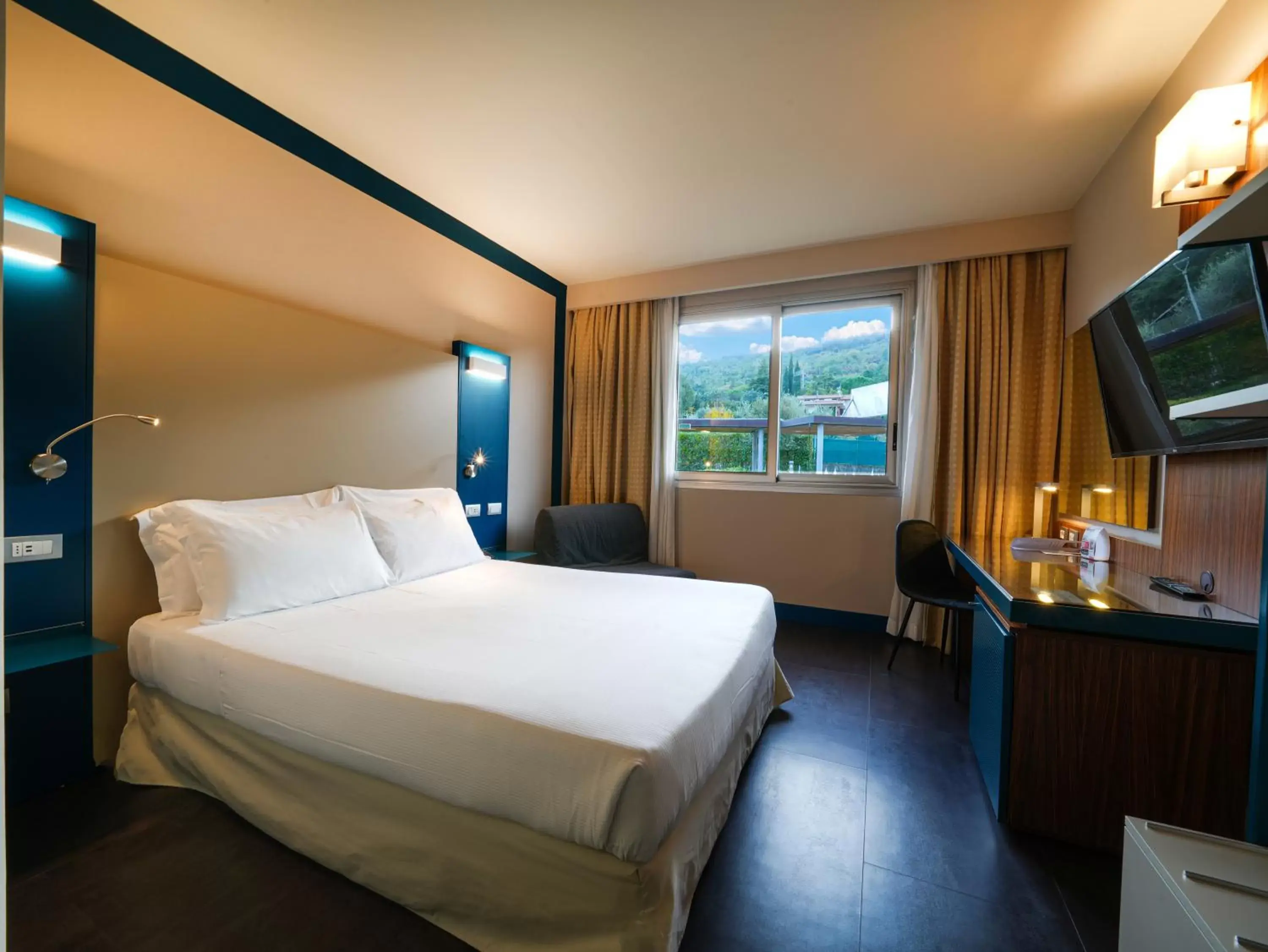 Bed in Hotel La Meridiana