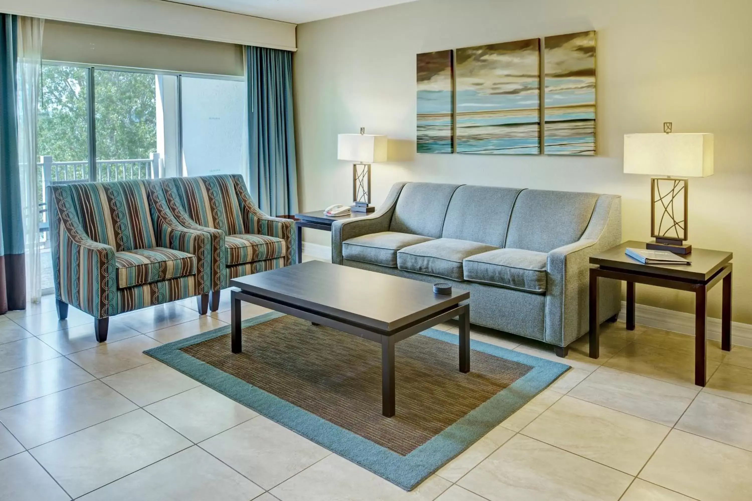 Living room, Seating Area in Summer Bay Orlando by Exploria Resorts