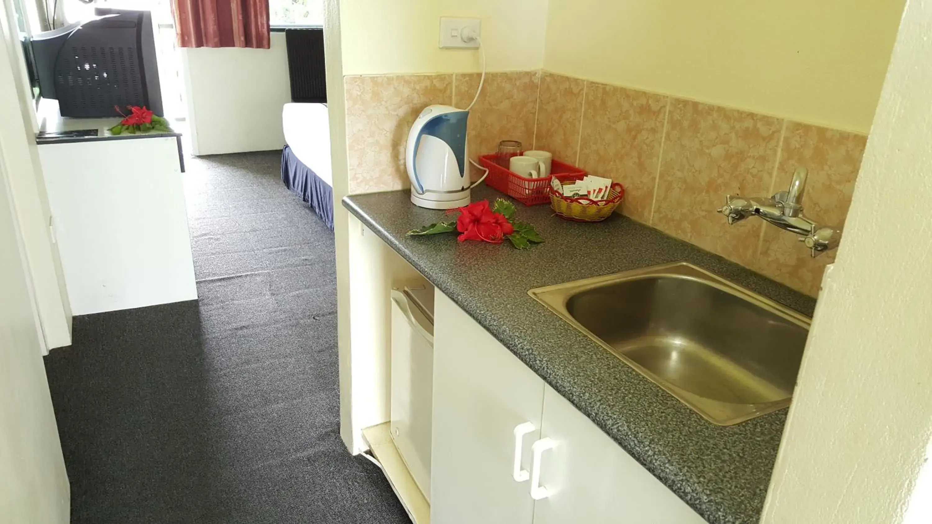 Living room, Kitchen/Kitchenette in Grand West Villas