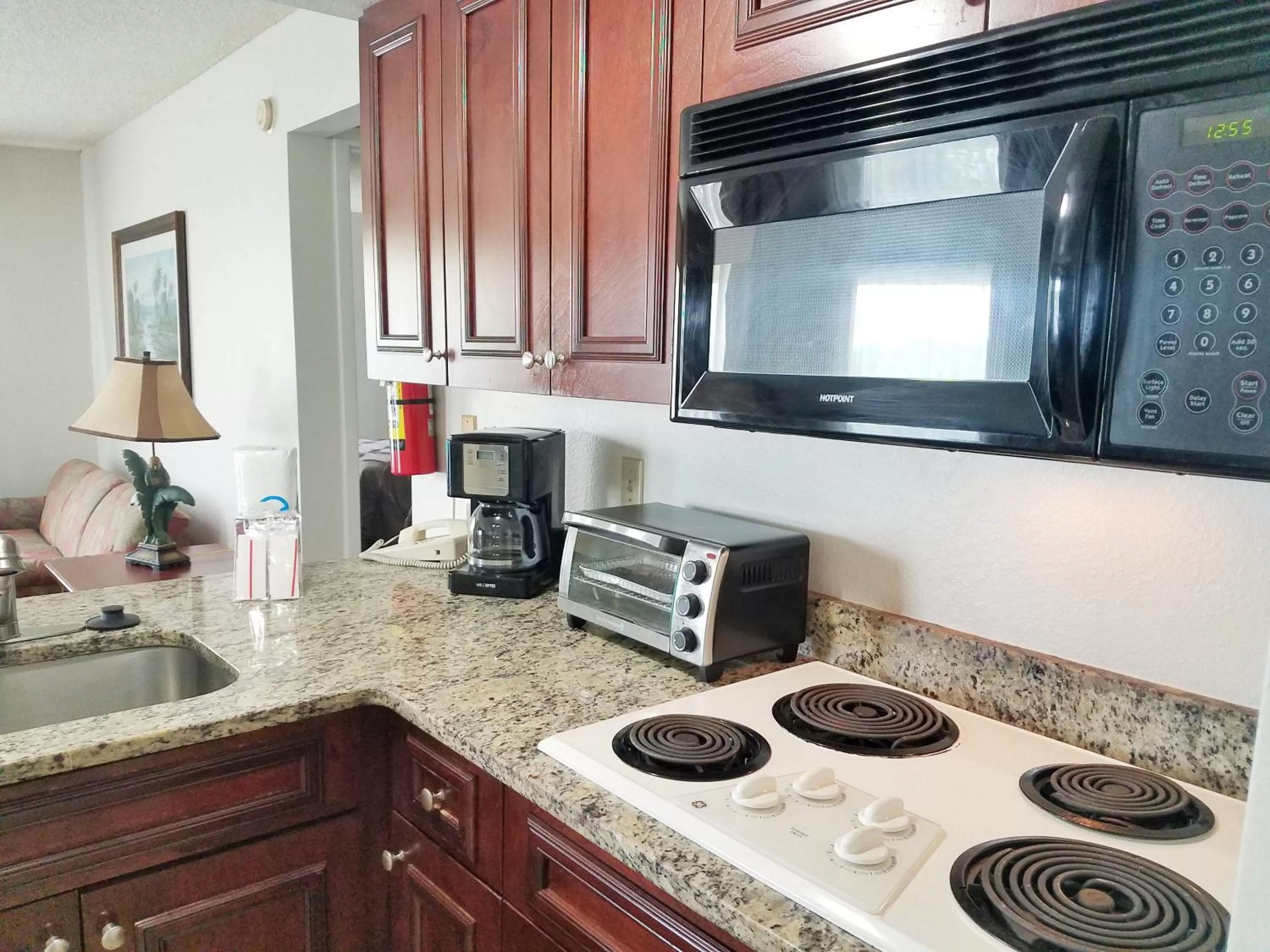 Kitchen or kitchenette in Parc Corniche Condominium Suites