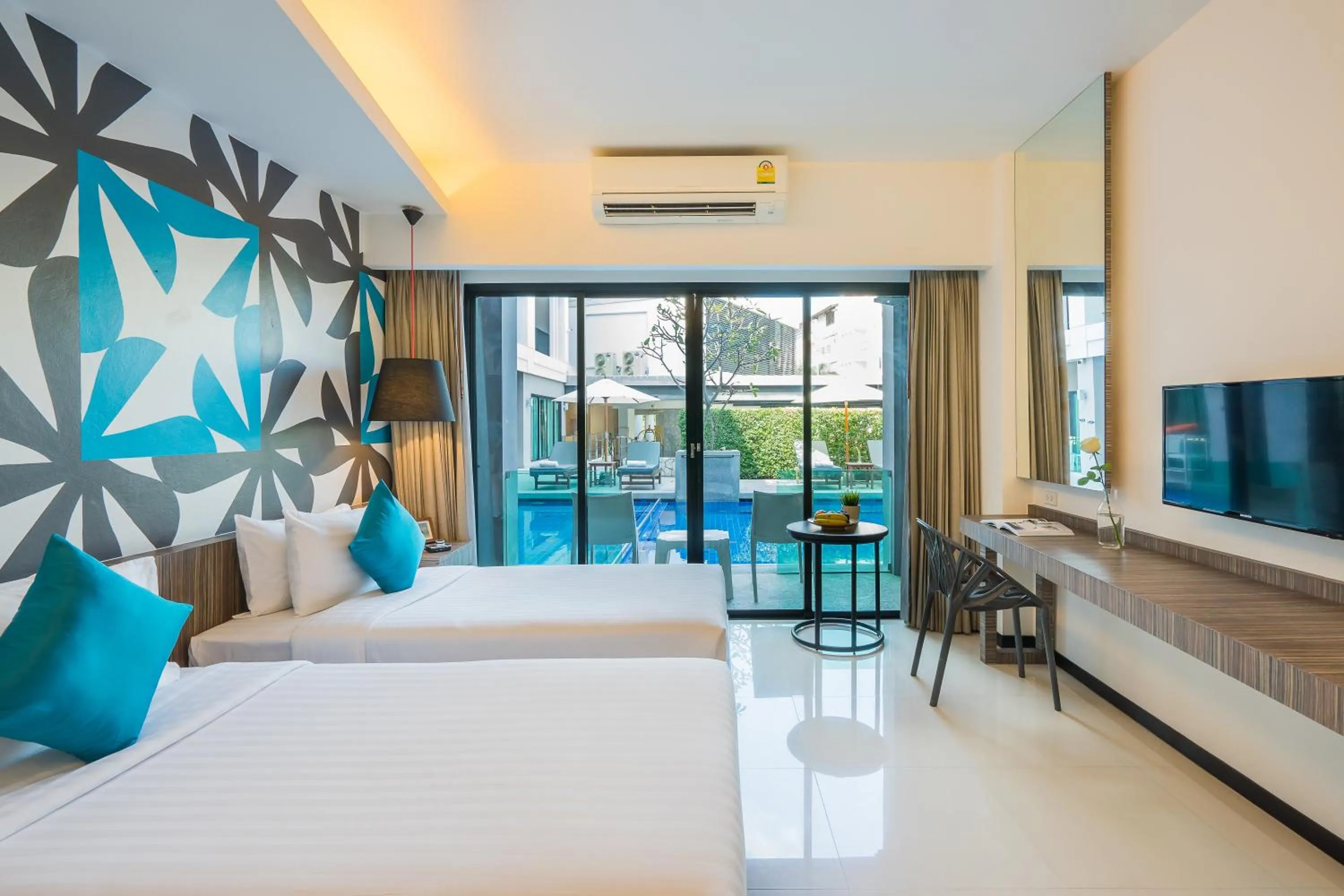 Bed in Hotel J Residence Pattaya