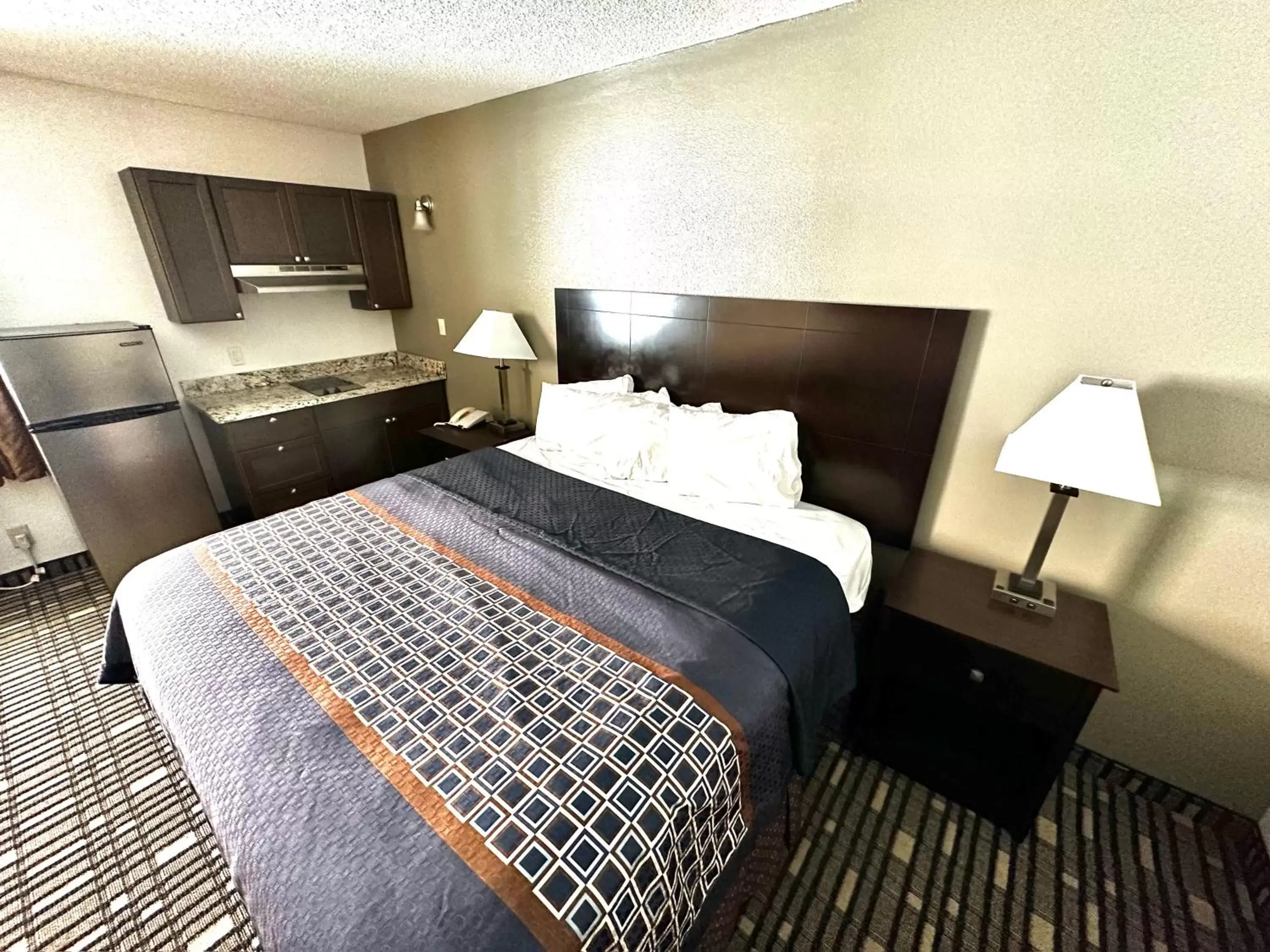 Guests, Bed in SureStay Plus Hotel by Best Western Lubbock Medical Center