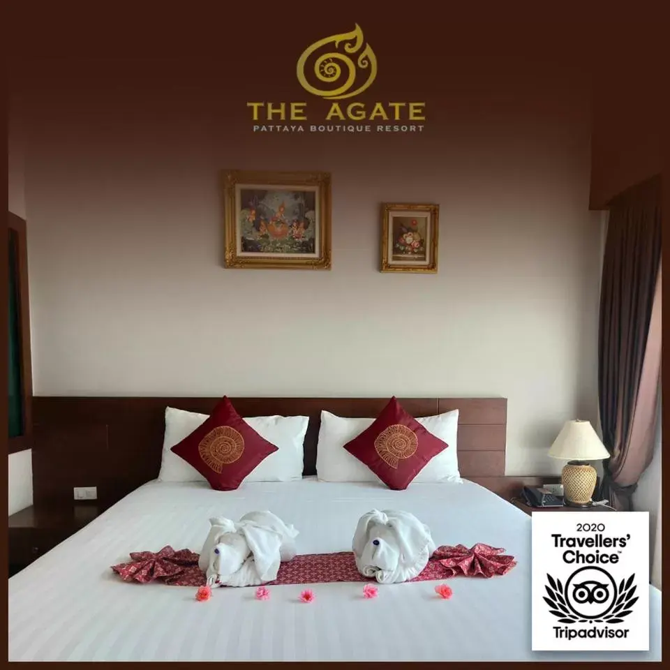 Bed in The Agate Pattaya Boutique Resort