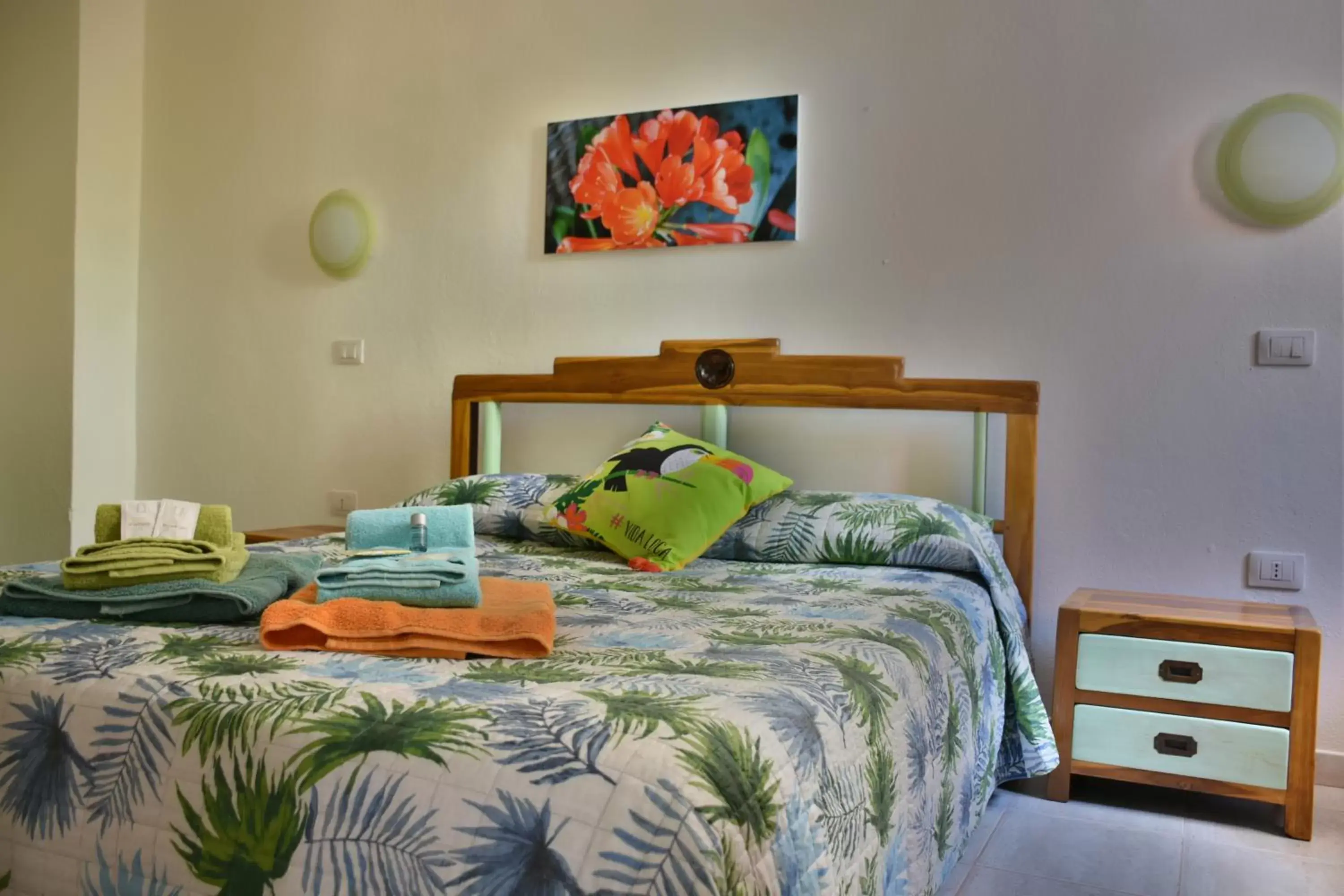 Bed in Flowery Inn Villa