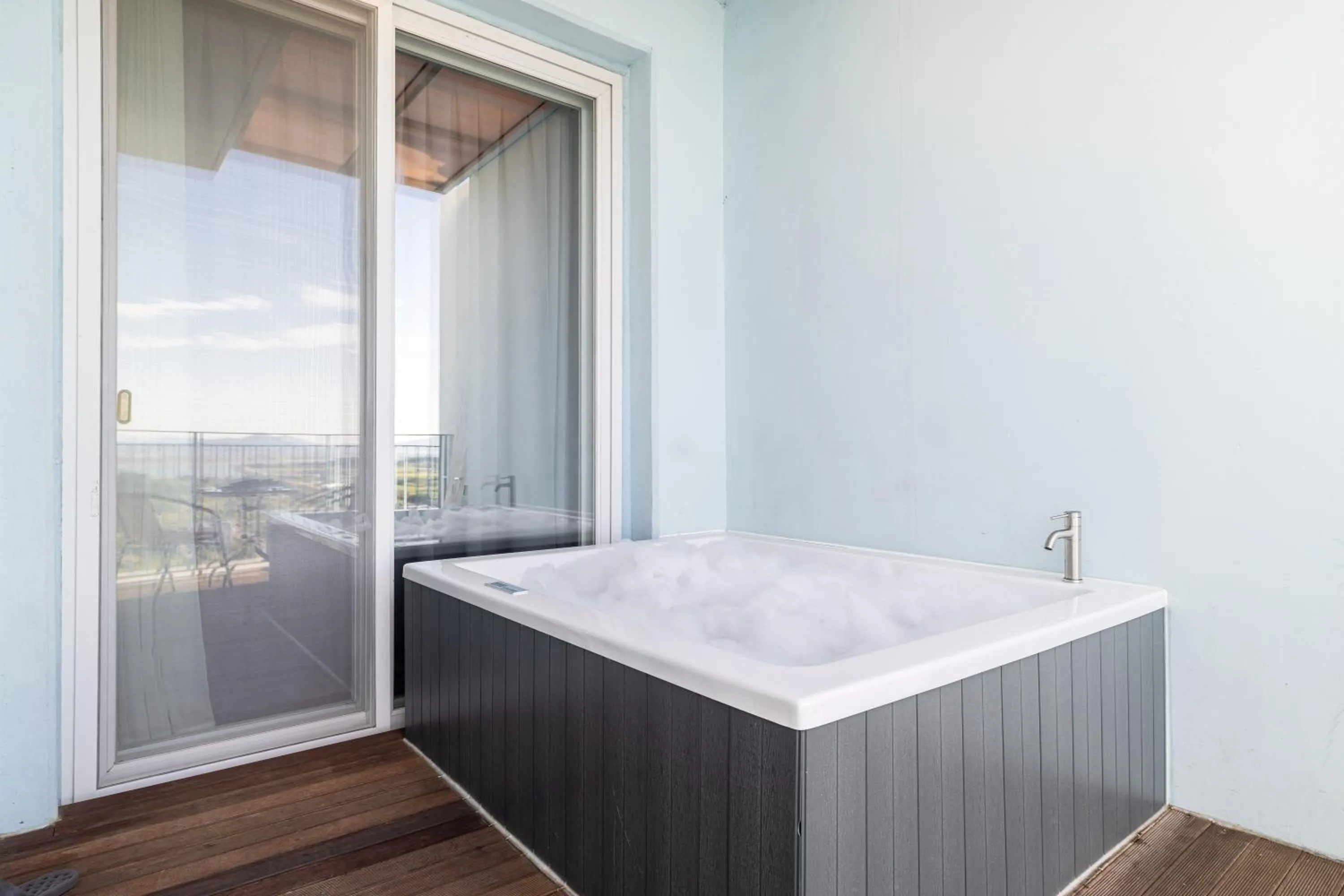 Bed in Ocean Soleview Hotel