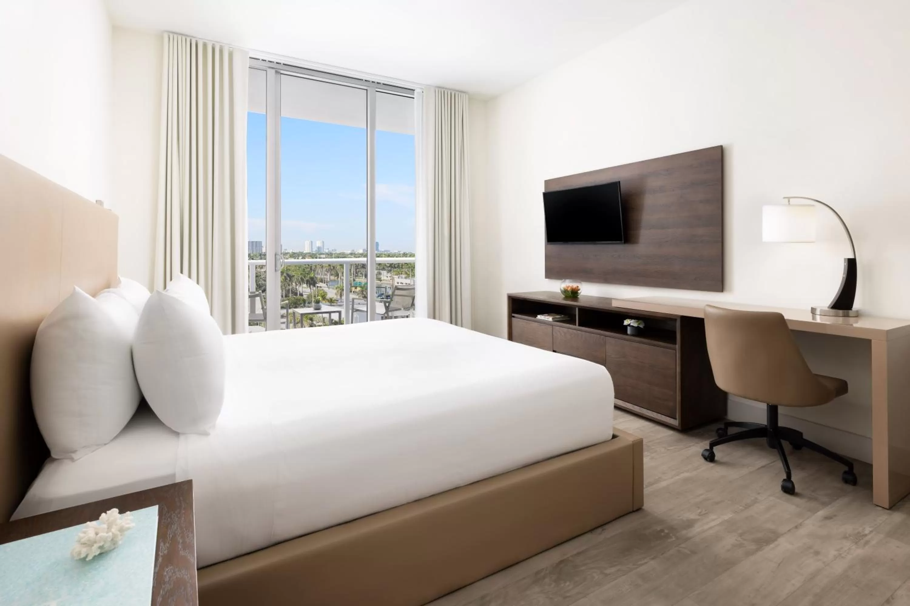 Bed in Costa Hollywood Beach Resort - An All Suite Hotel