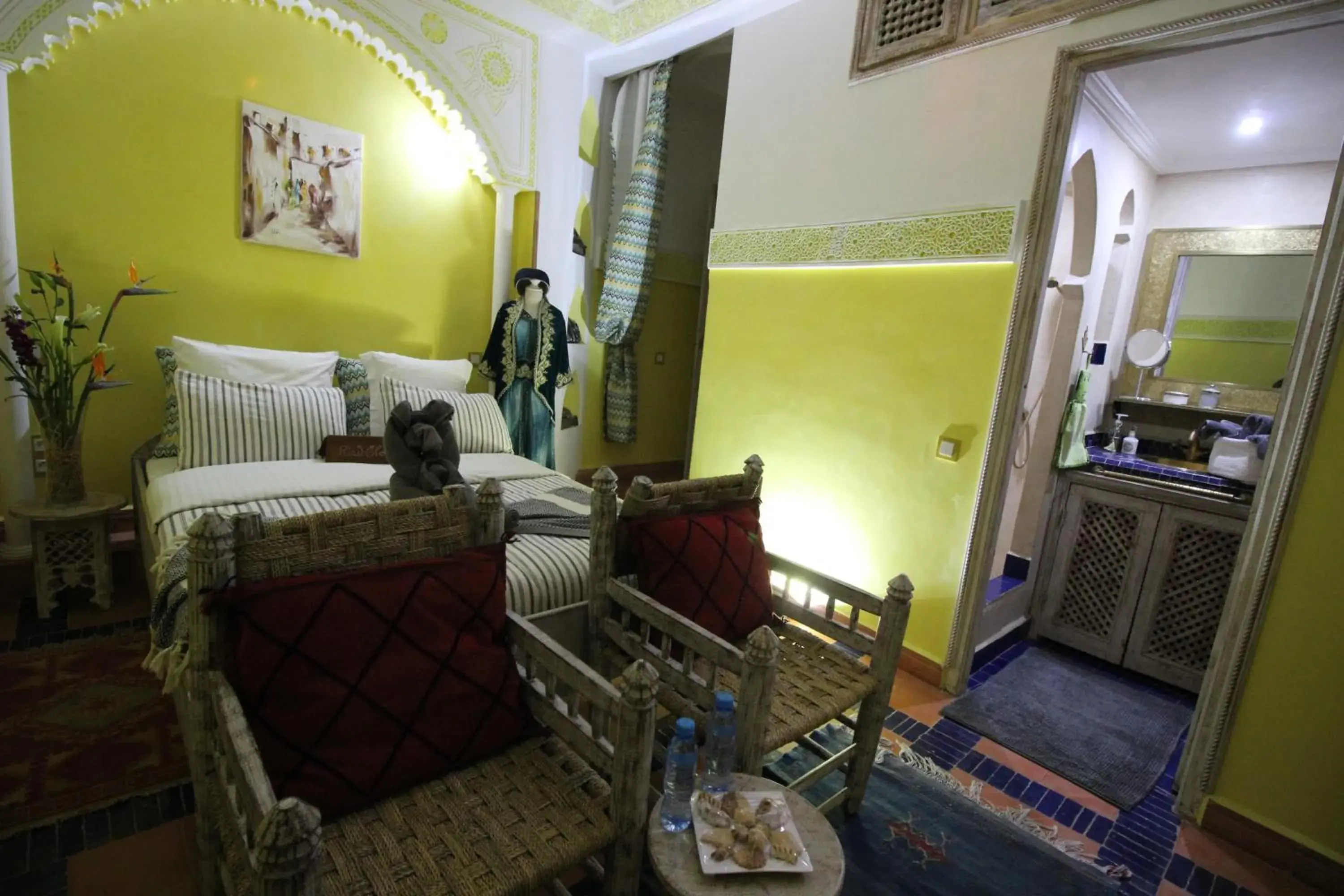Bed, Seating Area in Riad Eloise