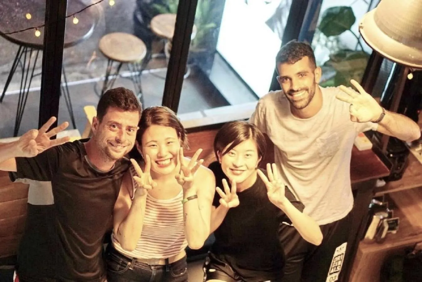 group of guests in Bangkok Nomad Hostel