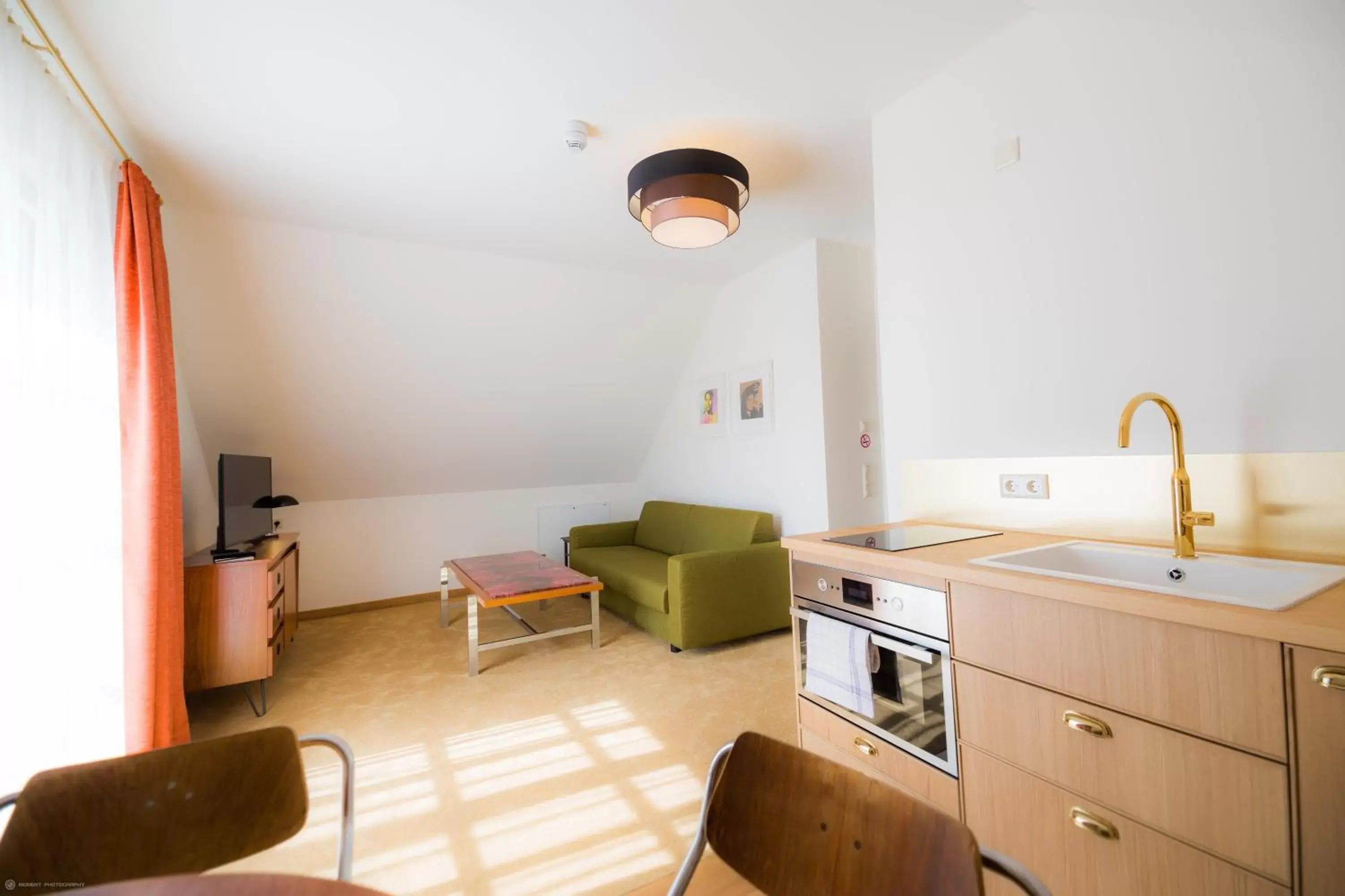 Living room, Kitchen/Kitchenette in Hotel Luis Stadl