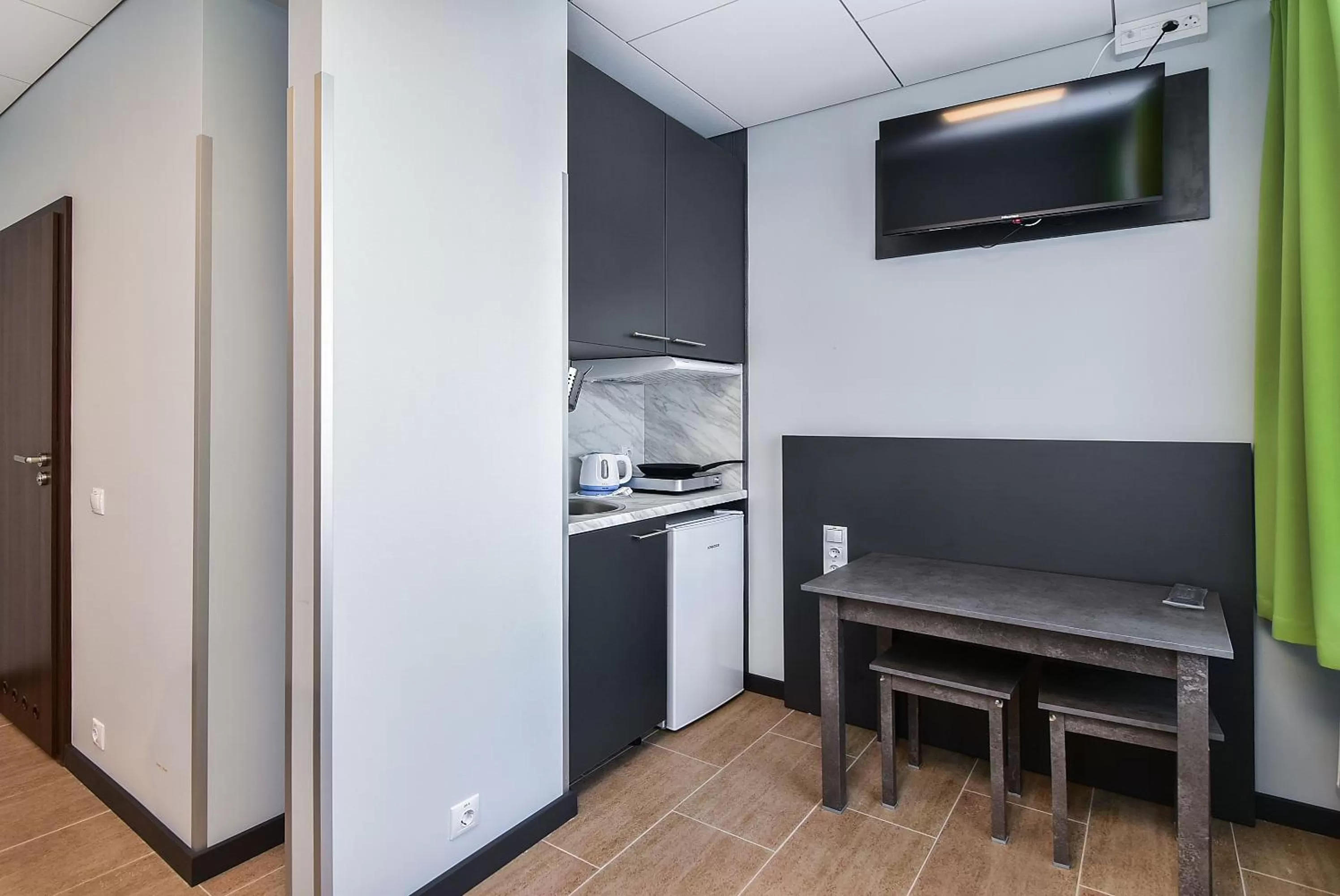 Kitchen or kitchenette in City Yard Inn Hotel