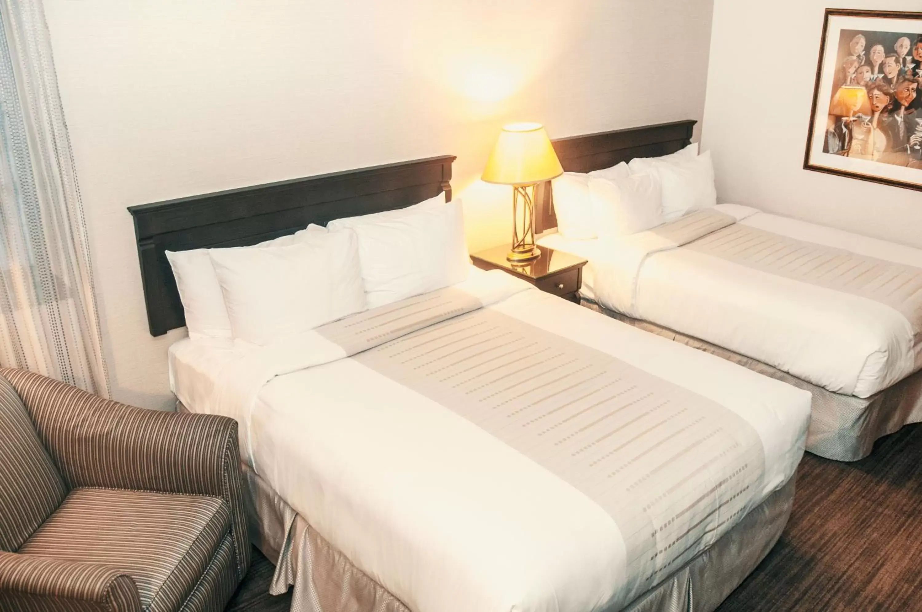 Bed in Hotel Le Montagnais