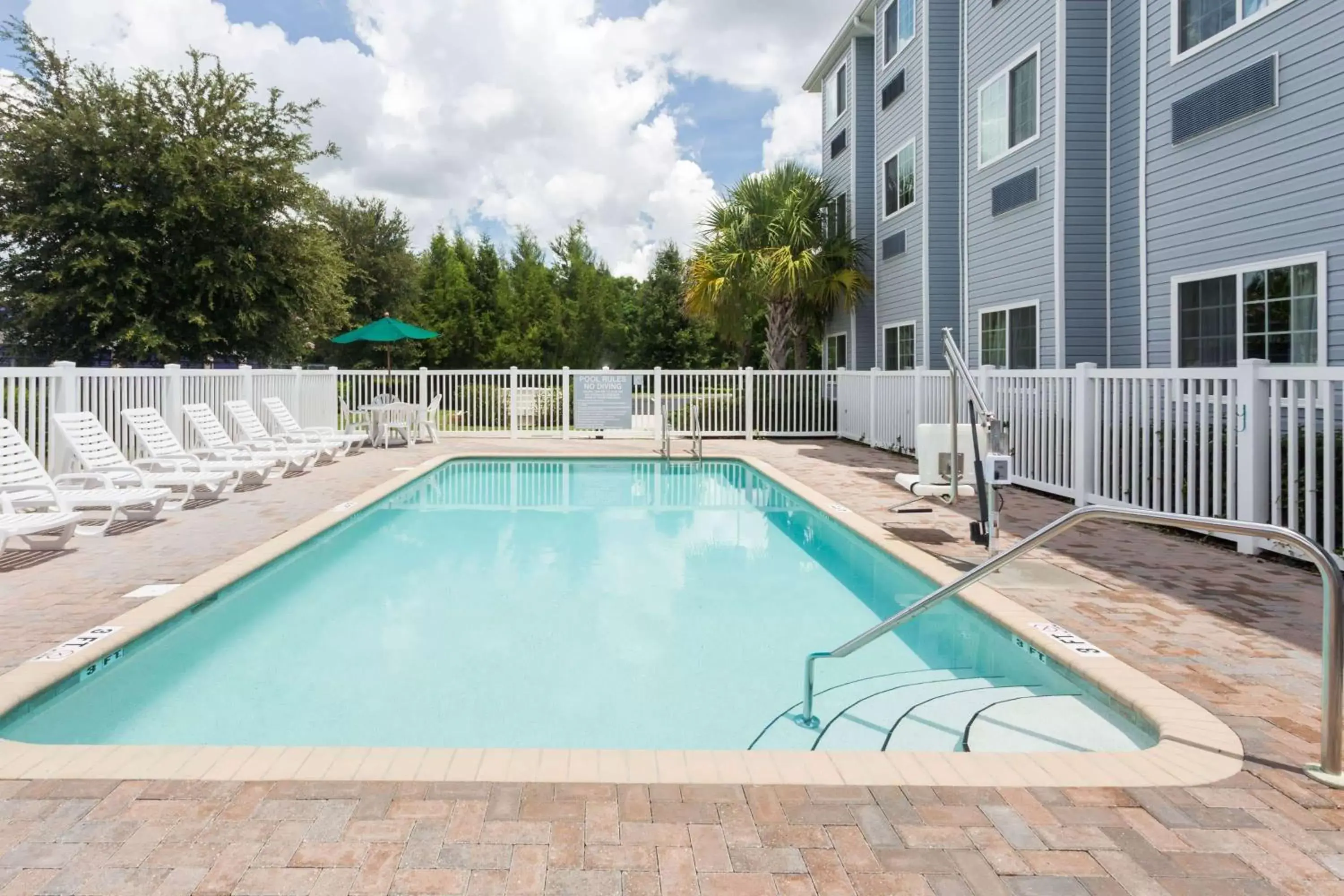 On site, Swimming Pool in Microtel Inn & Suites by Wyndham Spring Hill/Weeki Wachee