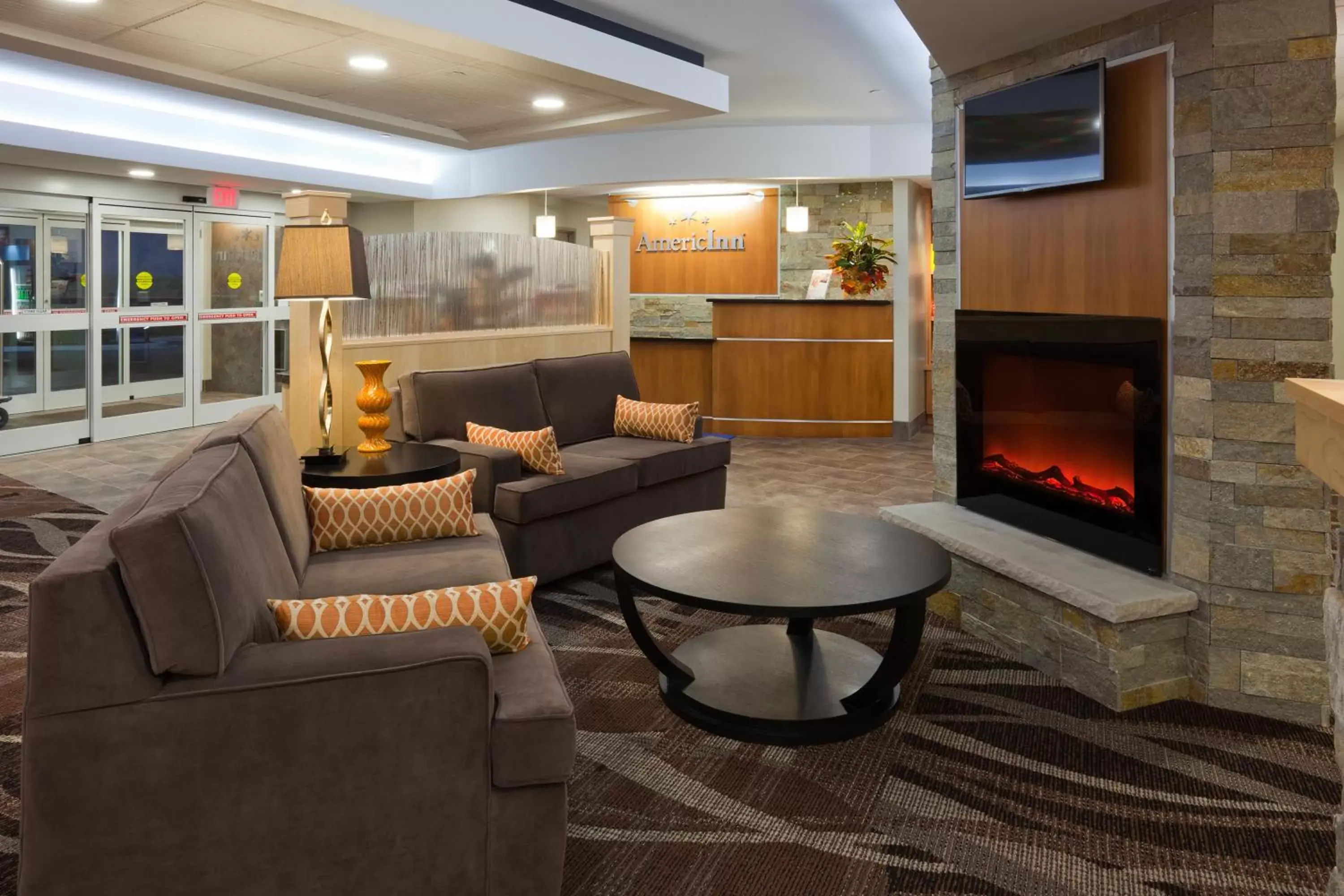 Lobby or reception, Seating Area in AmericInn by Wyndham Waupun